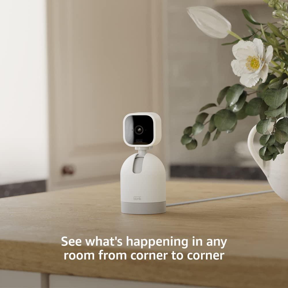 Blink Mini Pan-Tilt Camera  Rotating indoor plug-in smart security camera,  two-way audio, HD video, motion detection, Works with Alexa (White) White 1  Camera