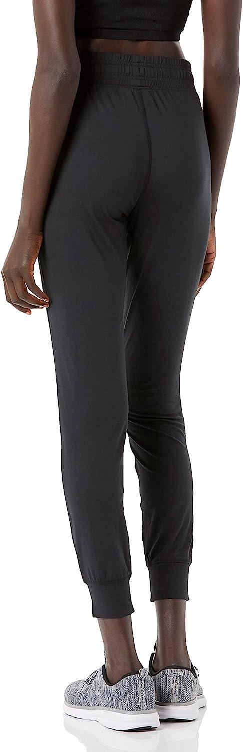 Essentials Women's Brushed Tech Stretch Jogger Pant (Available in  Plus Size) Small Black