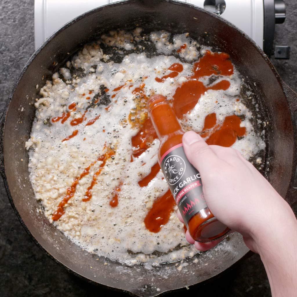Black Garlic And Carolina Reaper Hot Sauce By Bravado Spice FEATURED ON