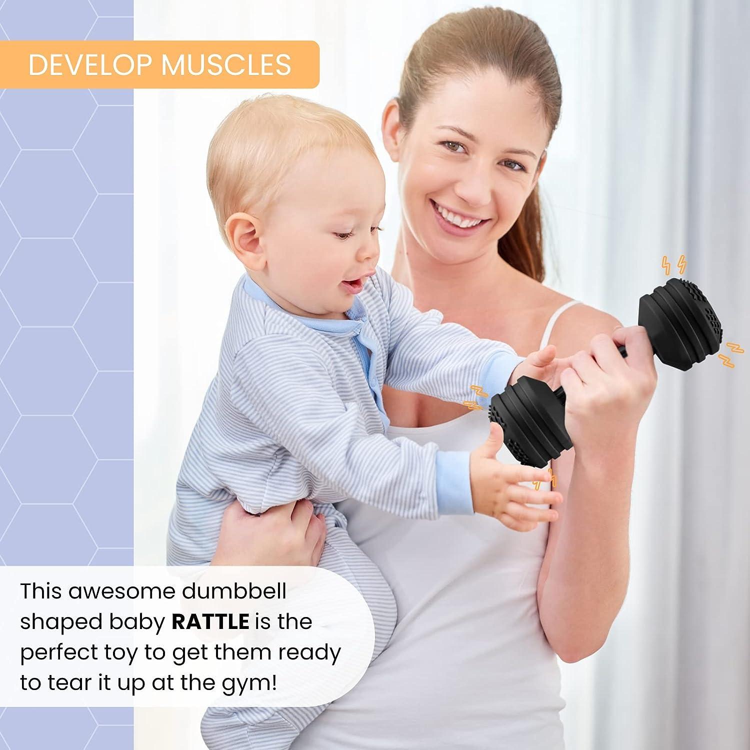 Baby with dumbbell shop