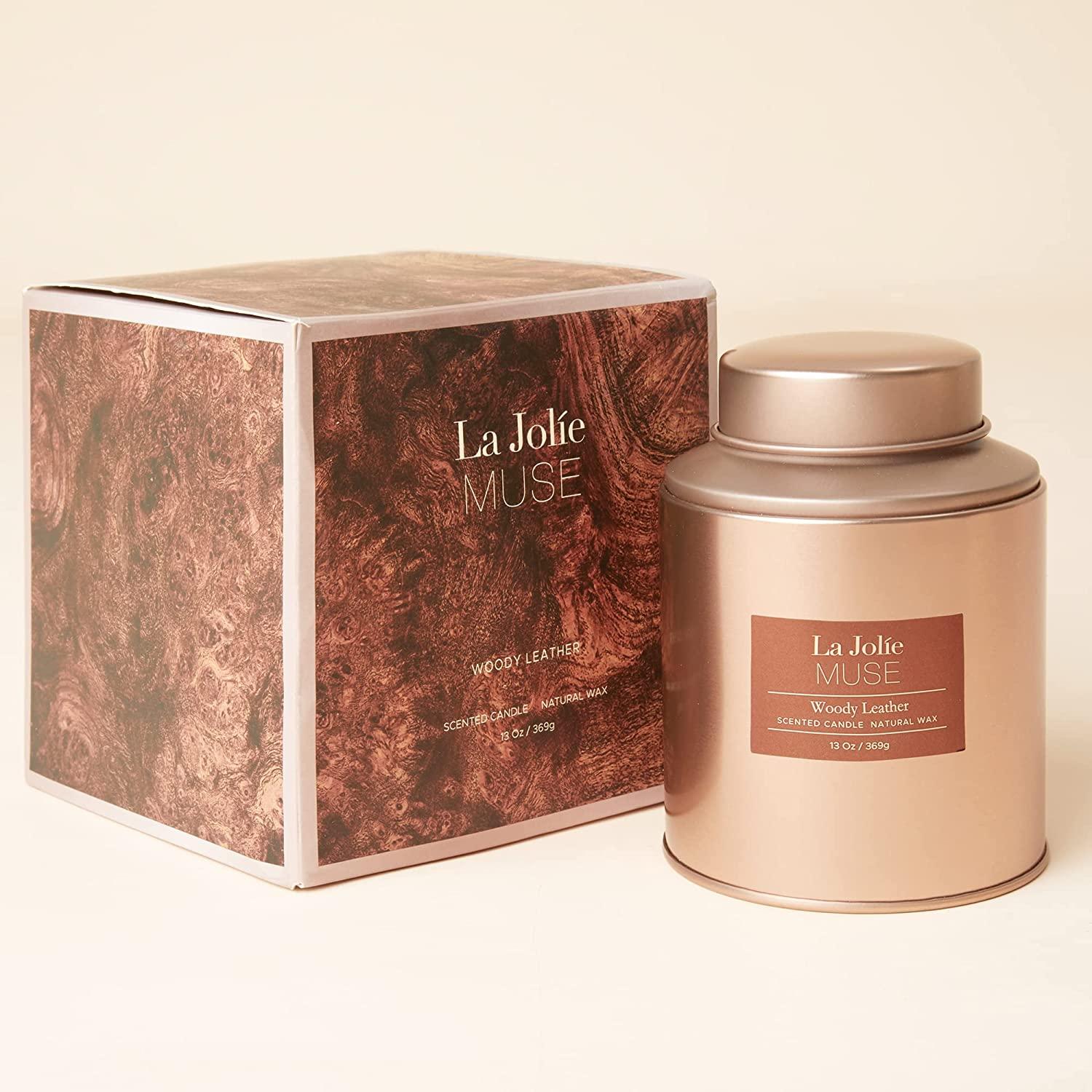 la jolie muse tobacco leaf herb La Jolie Muse Woody Leather Scented Candle - Natural Wax - 100 Hours Long  Burning - Holiday Tin