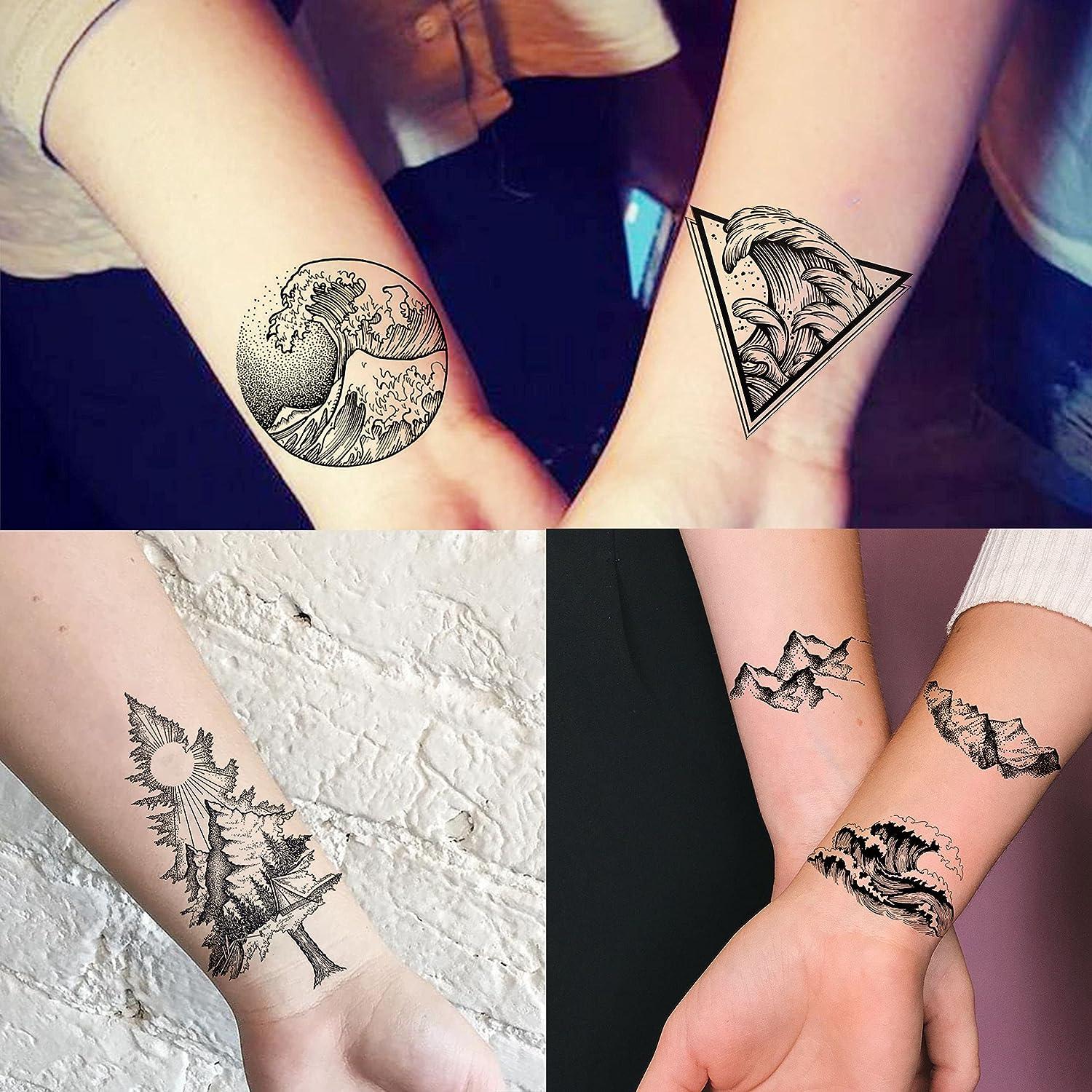 Small triangle tattoo on the left hand - Tattoogrid.net
