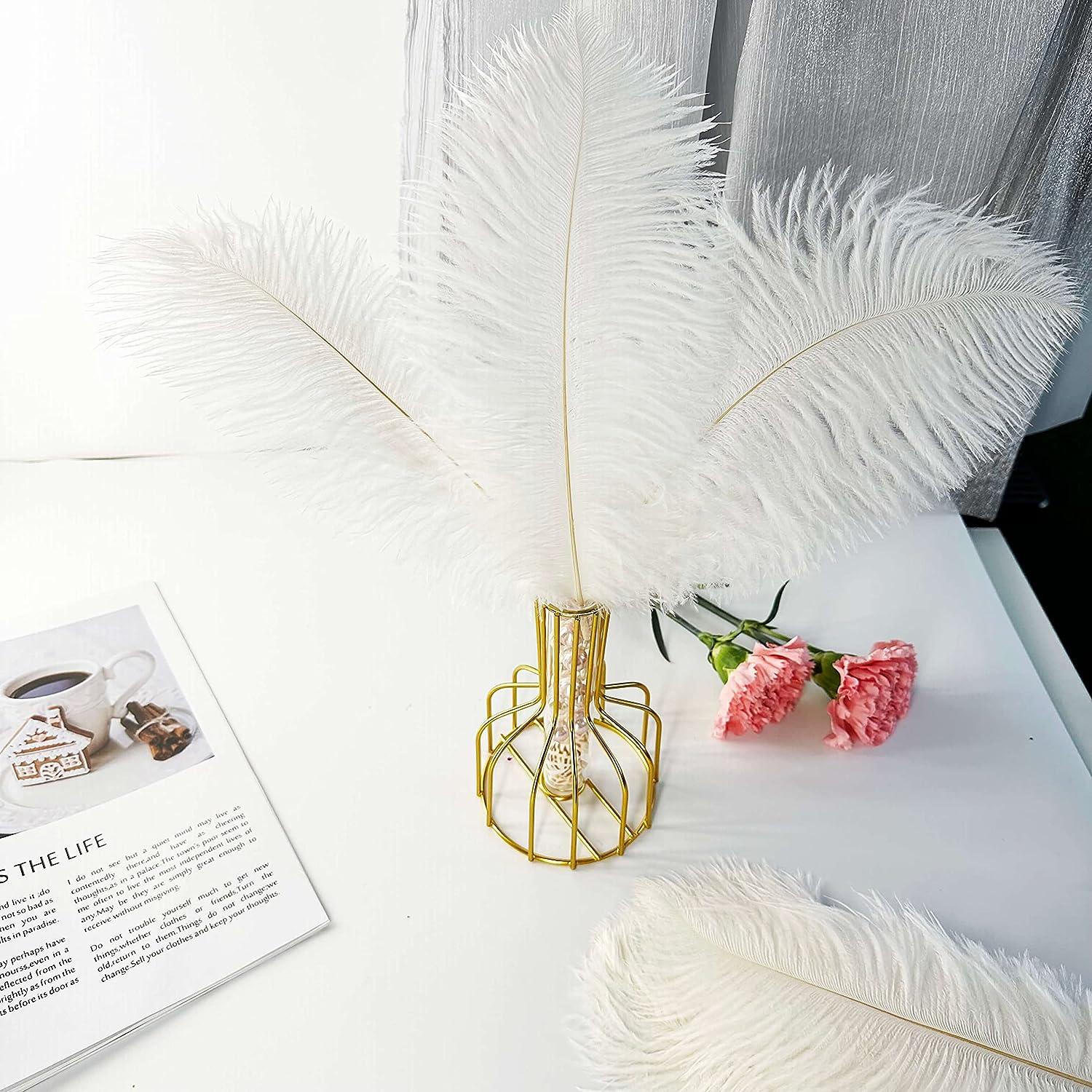 25 Best Ostrich Feather Centerpieces ideas  feather centerpieces,  centerpieces, ostrich feather centerpieces