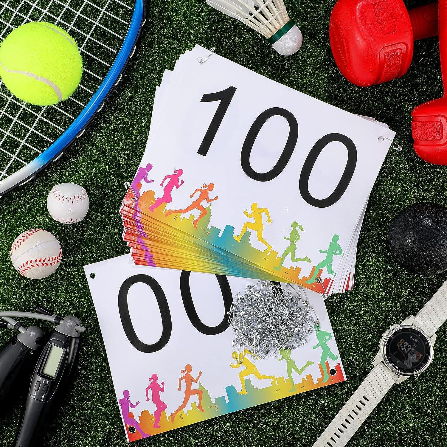 Running Bib Competitor Numbers with Safety Pins for Marathon Sports