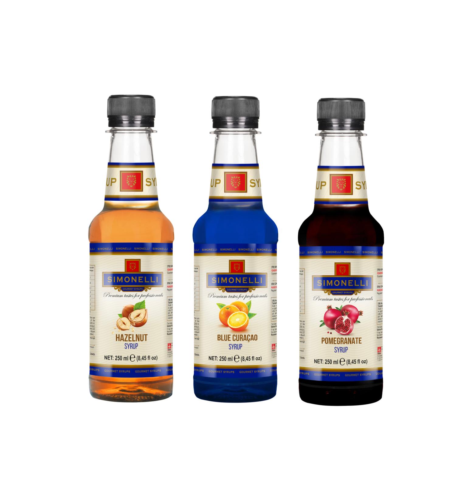 Simonelli 3-Piece Syrup Set (Hazelnut + Orange + Pomegranate) Coffee and Cocktail Syrup 3x250ml - Buy Online on GoSupps.com