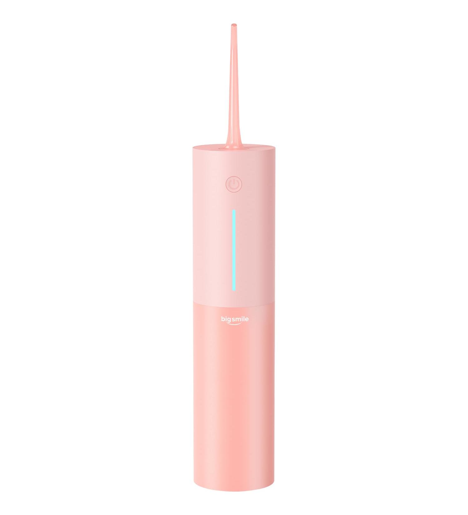 Bigsmile Pink Mini Water Flosser - Cordless Oral Irrigator for Kids Travel & Shower Use | Magnetic Wireless Charge | Dentist Recommended - Buy Online on GoSupps.com