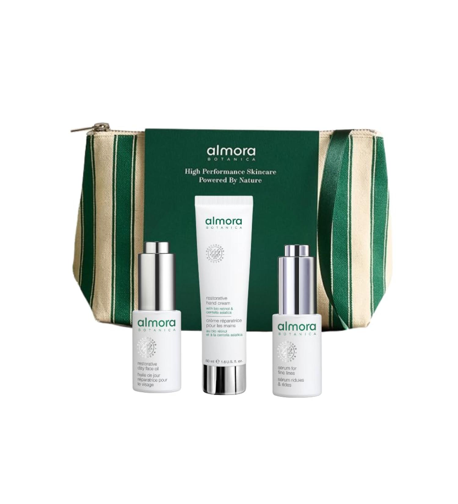 Almora Botanica Restore & Repair Gift Set 4 Piece | Restorative Hand Cream (50 mL) Restorative Day Face Oil (15 mL) Serum for Fine Lines (15 mL) & Complimentary Vanity Pouch
