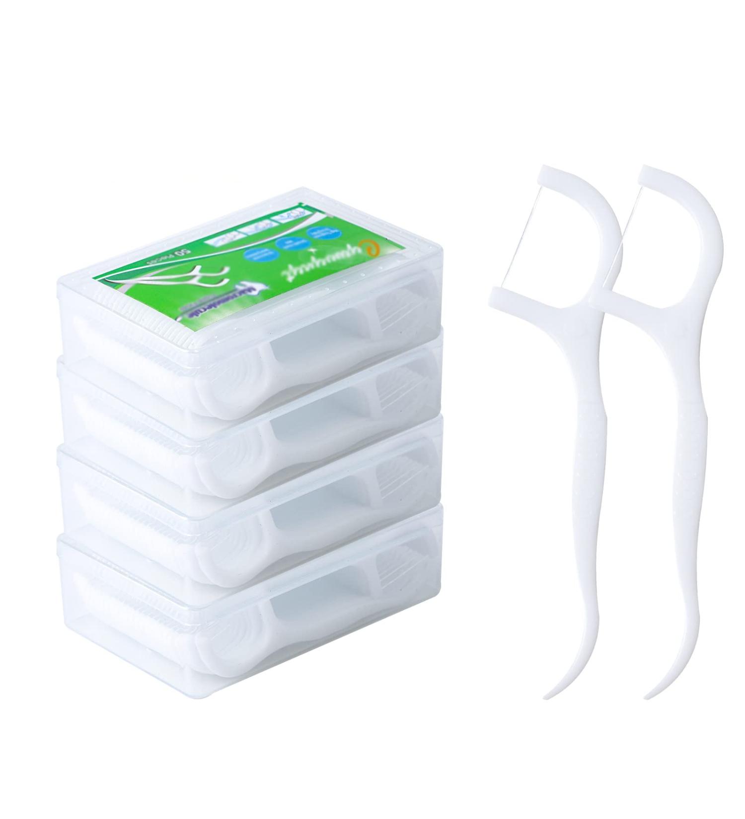 200 Dental Floss Sticks - Interdental Flossers with Toothpick Holder | Y-Form Design | Disposable Tooth Cleaner - 4 Pack - Buy Online on GoSupps.com