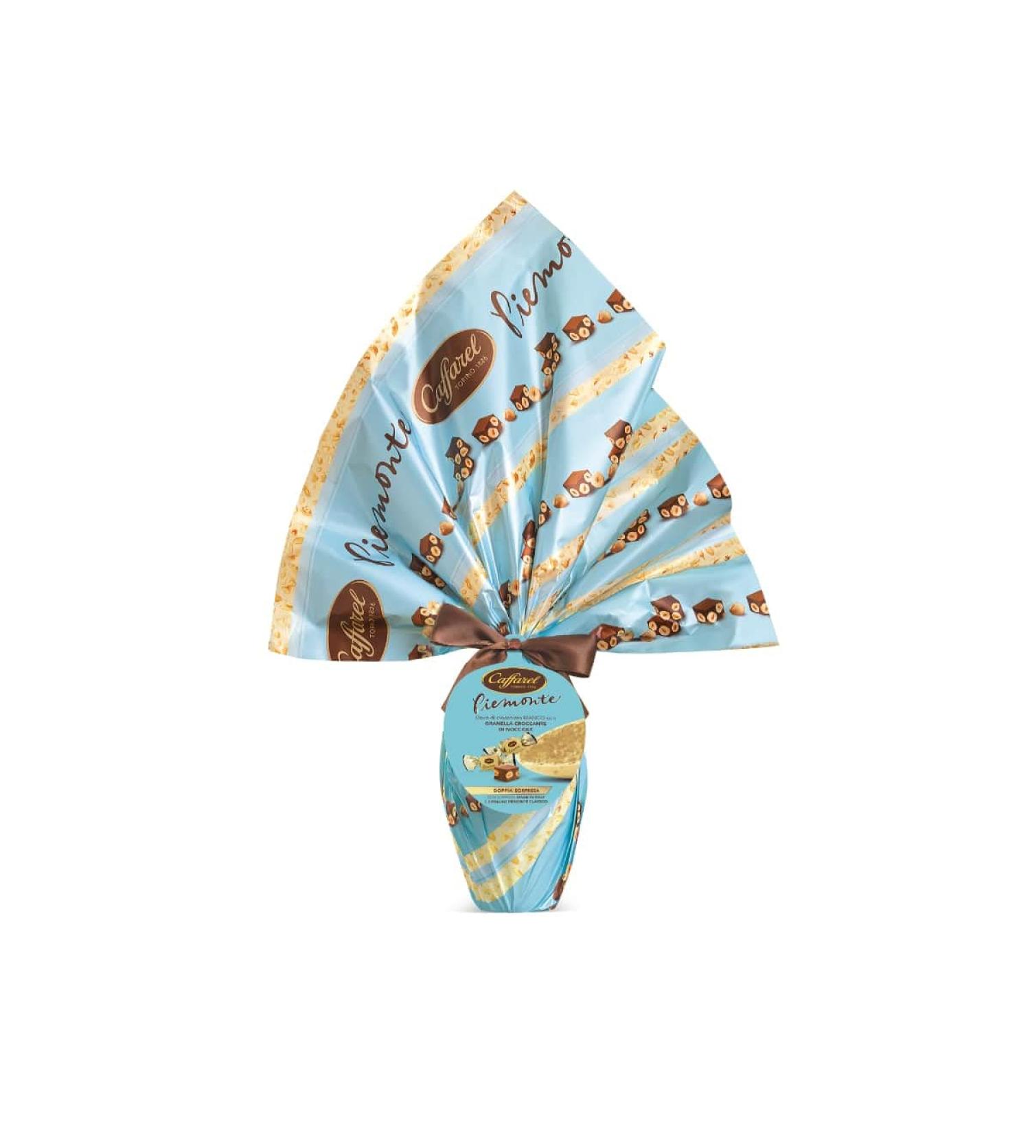 Caffarel MILK CHOCOLATE EGG WITH GRANELLE OF KNOISEAUX 270 GR CONTAINING 3 CHOCOLATE PRALINES WITH MILK AND HAZELNUTS GIANDUIA WITH WHOLE WALNUTS (2%) GLUTEN FREE