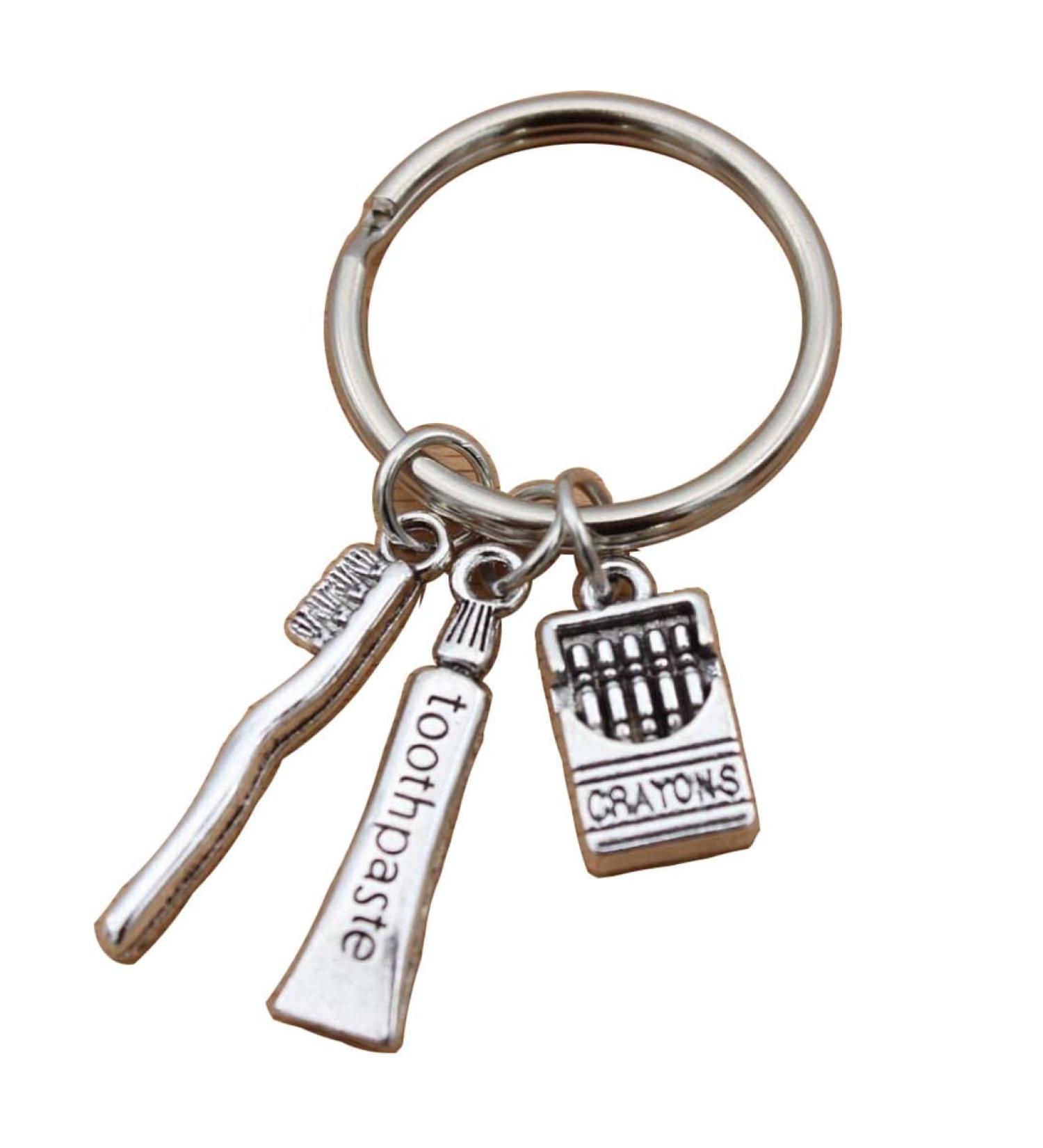 TARAKI Ancient Silver Toothpaste & Toothbrush Keychain | Unique Toothbrush Keyring & Zipper Pull - International Shipping - Buy Online on GoSupps.com