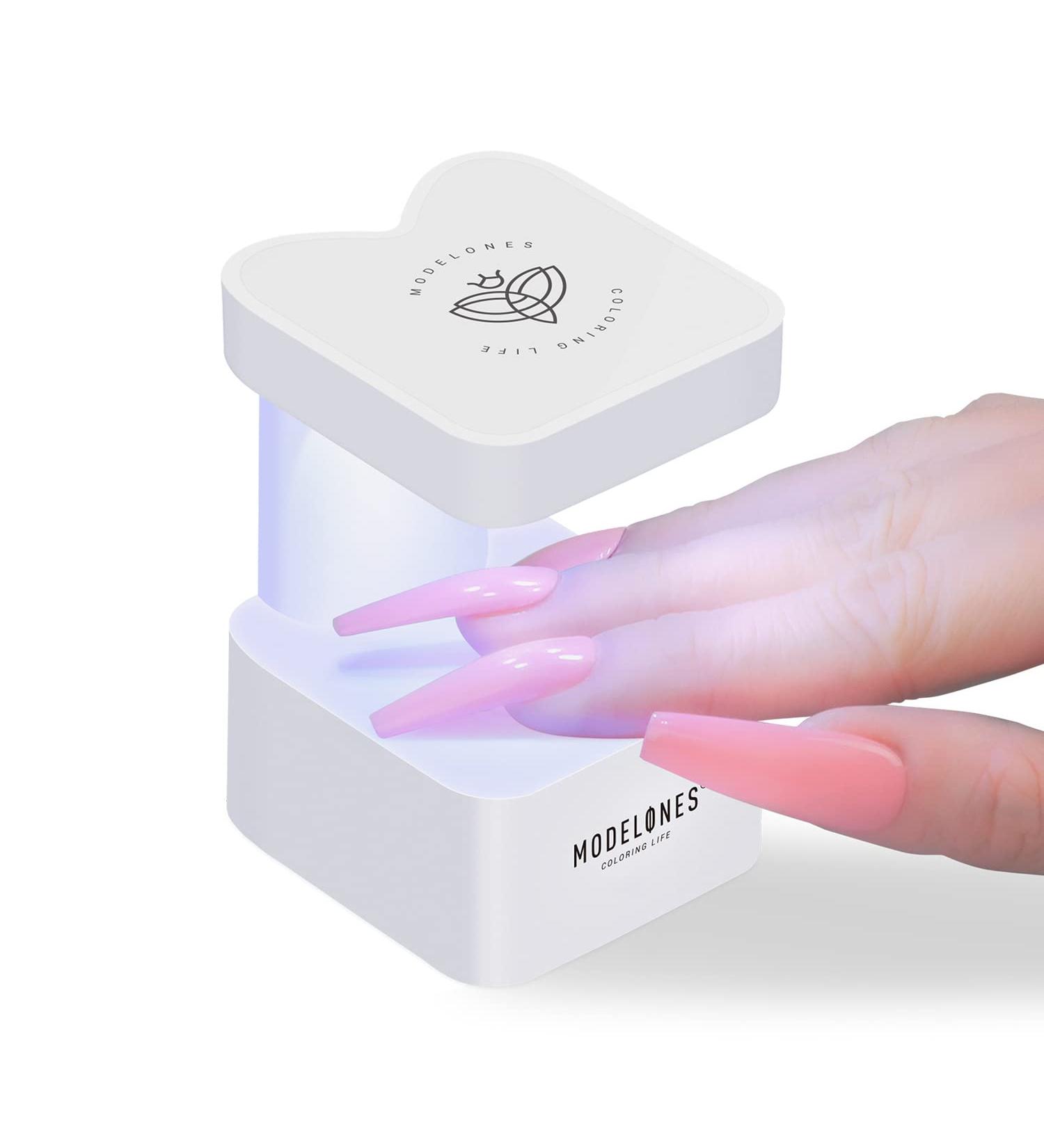 Modelones Mini LED Nail Lamp - Portable UV Gel Nail Dryer with Quick-Dry Technology - Travel-Friendly Cute Meow Design for Home DIY Manicures - Buy Online on GoSupps.com