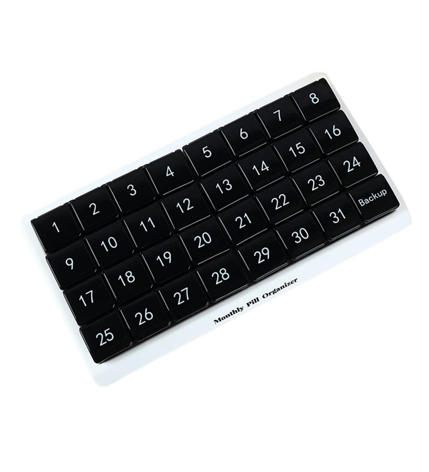 Buy TRIPPER Monthly 31 Compartment Pill Organizer - 1 Per Day for a Full Month - Black - Ideal for International Shipping - Buy Online on GoSupps.com