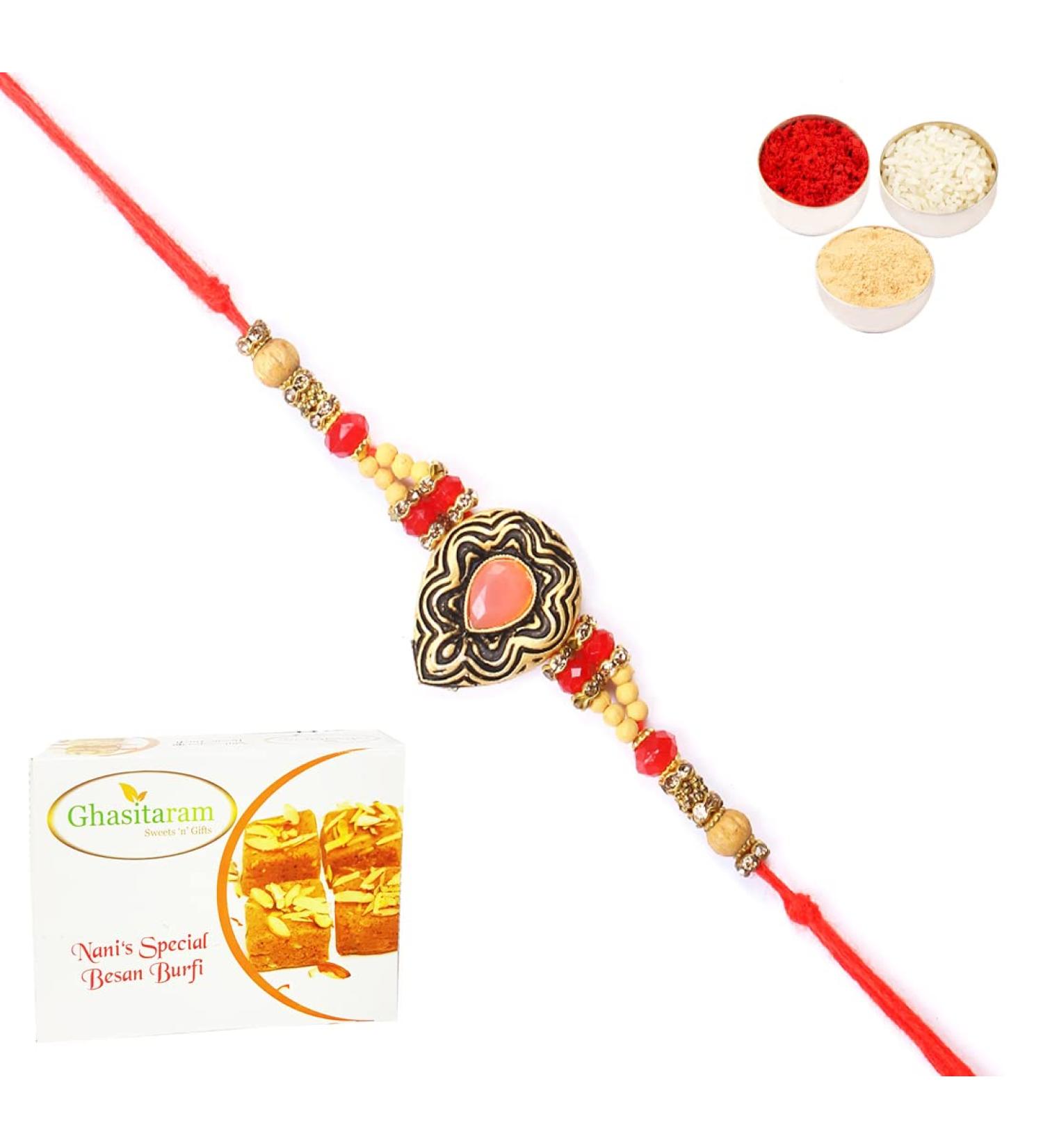 Ghasitaram Gifts Rakhi for Brother Rakhis Online - 8487 Premium Rakhi with 200 GMS of Besan Barfi - Buy Online on GoSupps.com
