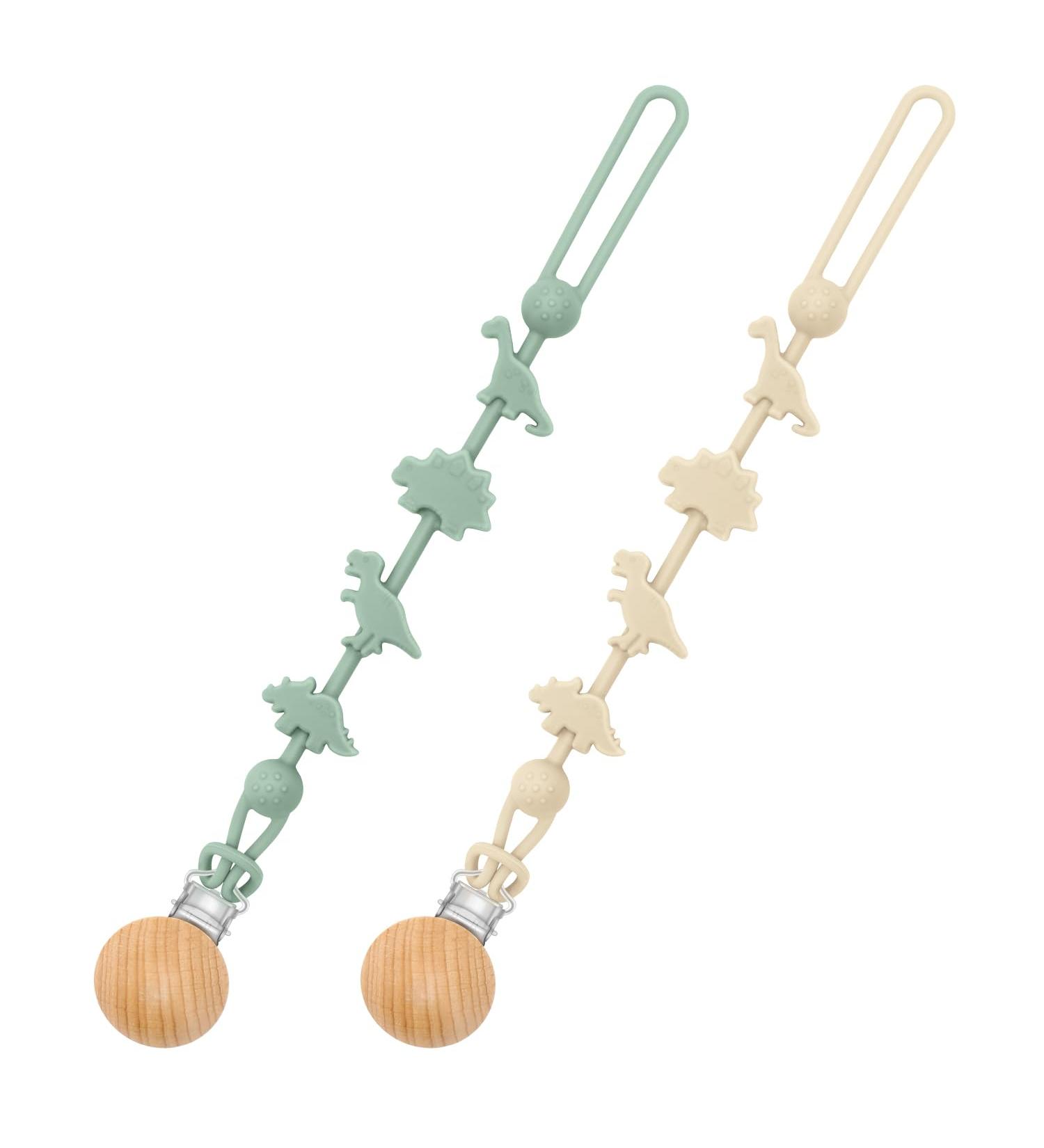 CLdy Silicone Pacifier Chain - 2 Dinosaur Pattern Clips for Boys & Girls | Soft Flexible High Robustness | Perfect Baby Accessory in Green/Naked Pink - Buy Online on GoSupps.com