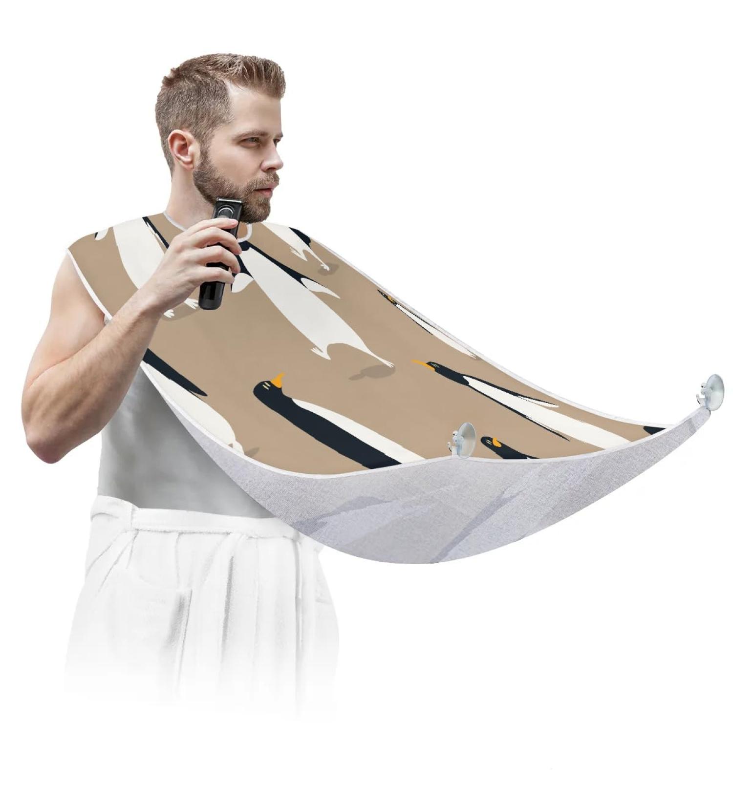 Cartoon Penguins Beard Bib Apron for Men - Non-Stick Waterproof Beard Hair Catcher with Suction Cups | Ideal Grooming Gift - Buy Online on GoSupps.com