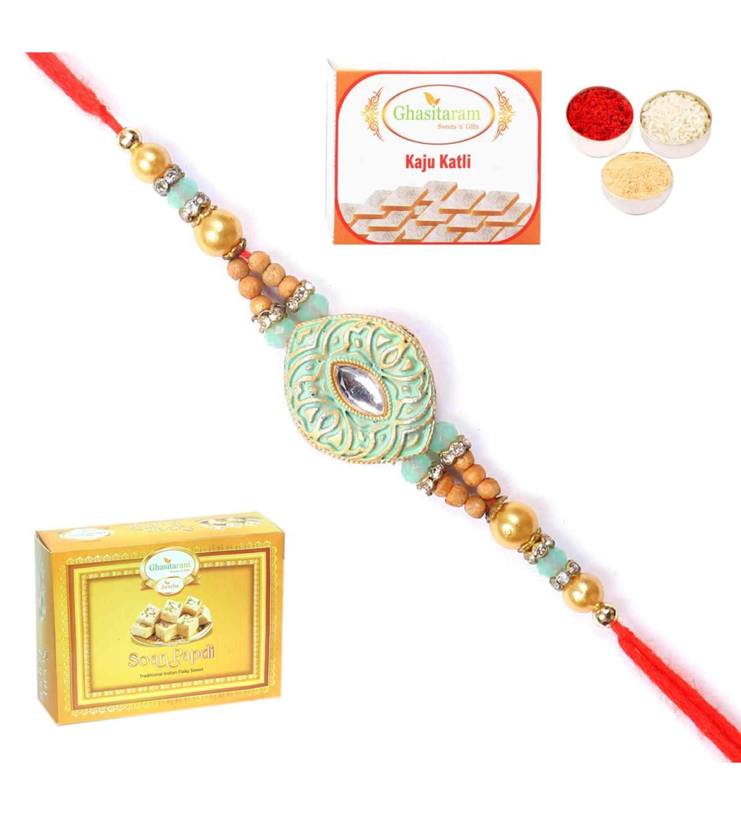 Ghasitaram Gifts Rakhi for Brother Rakhis Online - 8469 Premium Rakhi with 200 GMS of Kaju katli and 200 GMS of Soan Papdi Rakhi with 200 gms of Kaju katli and Soan Papdi - Buy Online on GoSupps.com