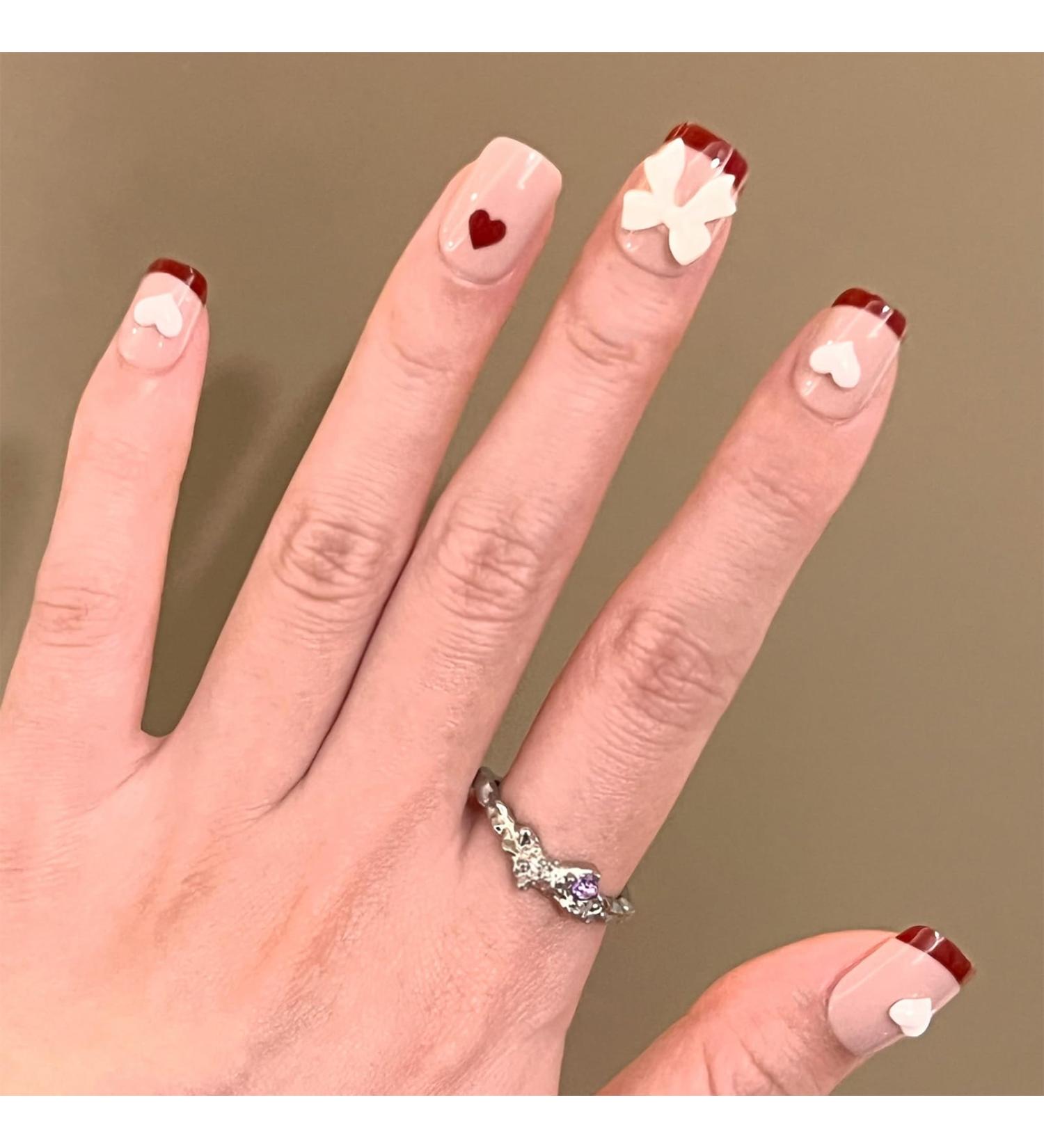 SONGQEE 24 Pieces Short False Nails Fake Nails with Glue - Full Cover Artificial Fingernails Fake Nails with Nail Glue (Cute Bow Tie Design) - Buy Online on GoSupps.com