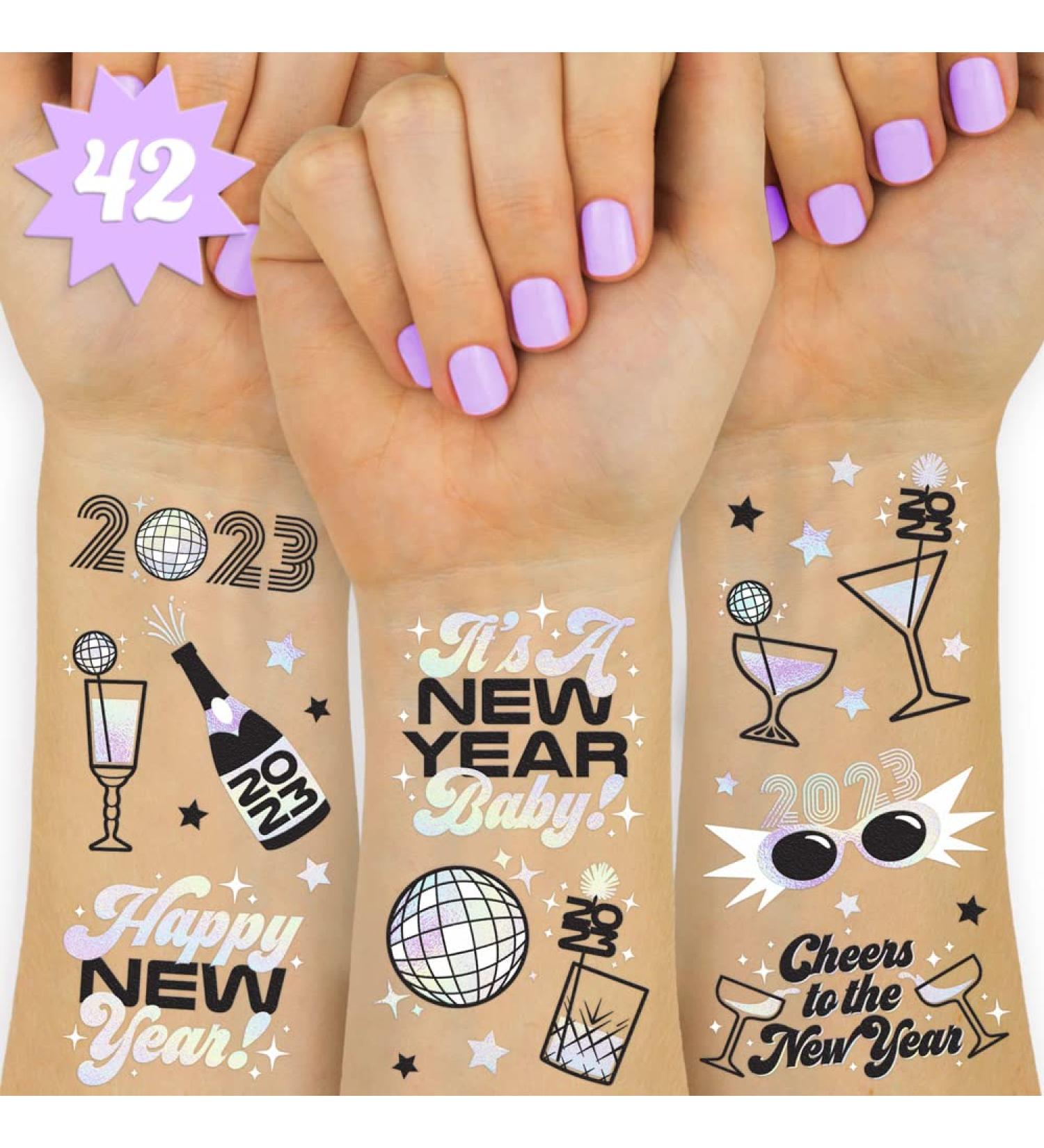 xo  Fetti New Years Eve Party Supplies Tattoos - 42 Glitter Styles | NYE Party Favors  Happy New Year Decorations  NYE 2023 Decor - Buy Online on GoSupps.com