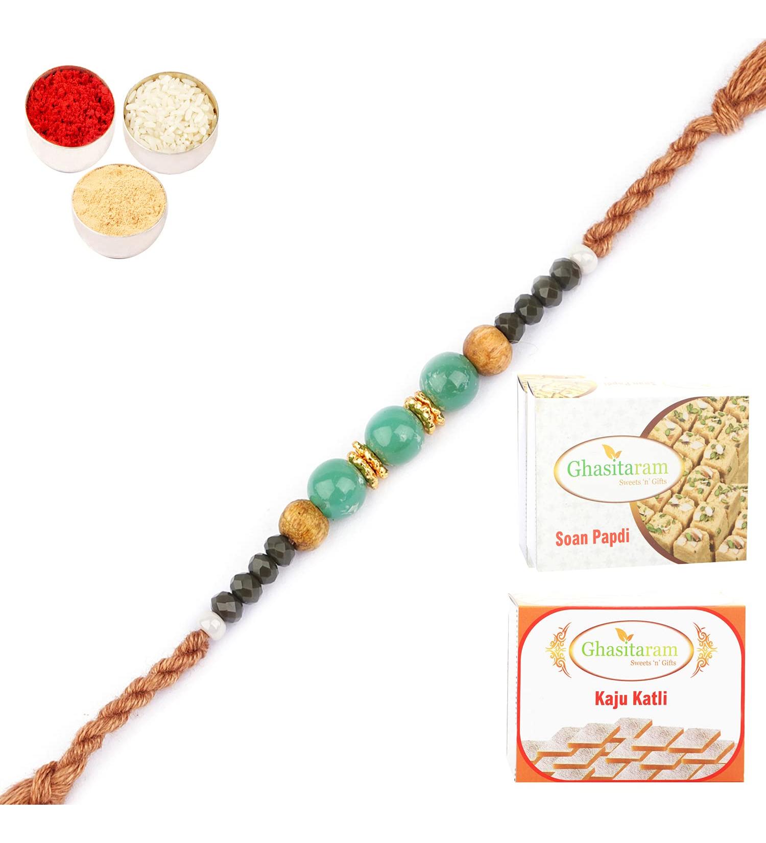 Ghasitaram Gifts Rakhi for Brother Rakhis Online - 1897 Fancy Thread Rakhi with 200 GMS of Kaju katli and 200 GMS of Soan Papdi Rakhi with 200 GMS of Kaju katli and Soan Papdi - Buy Online on GoSupps.com