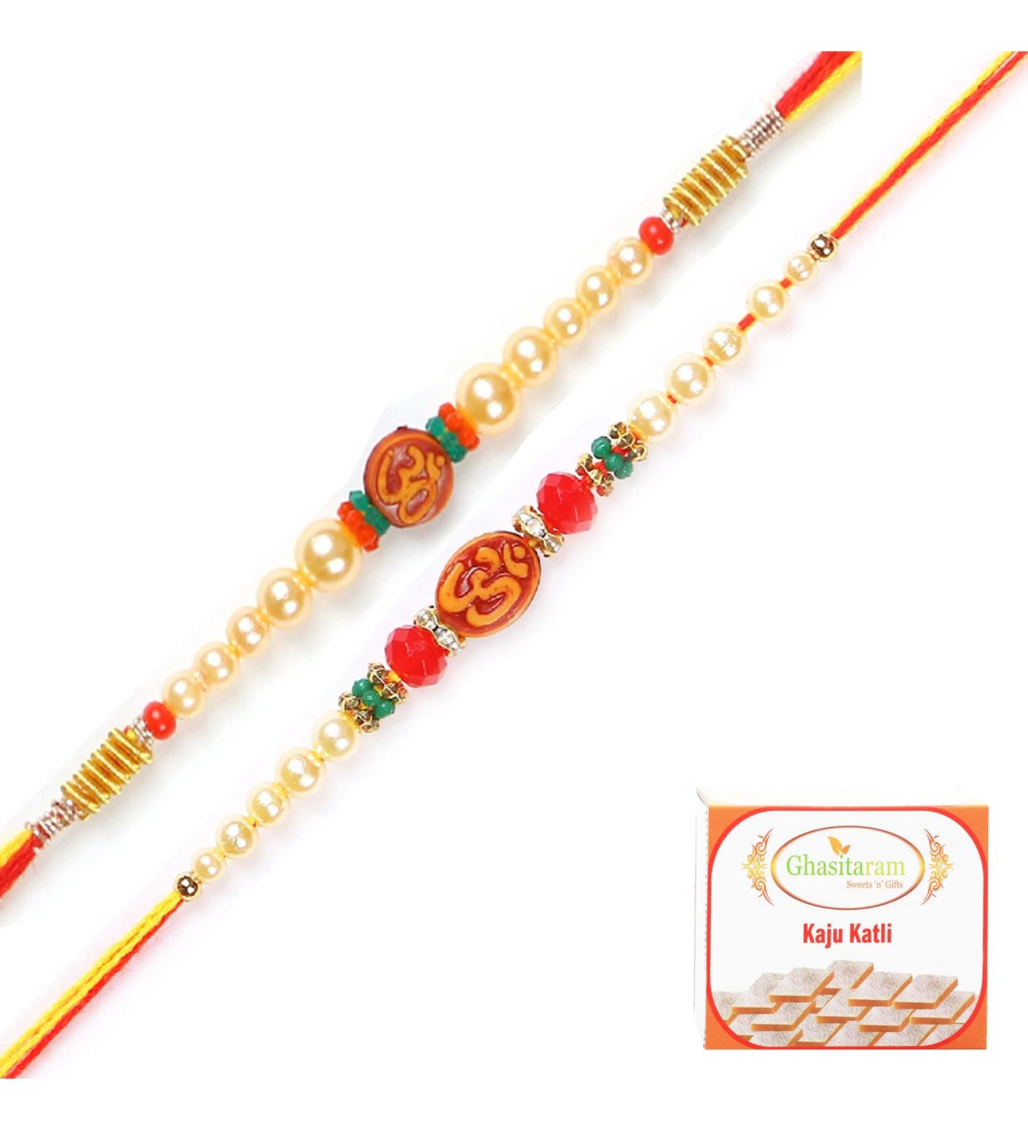 Ghasitaram Gifts Rakhi for Brother Rakhis Online - Set of 2 6135 6276 Om Pearl Rakhi Threads with 400 GMS of Kaju katli - Buy Online on GoSupps.com