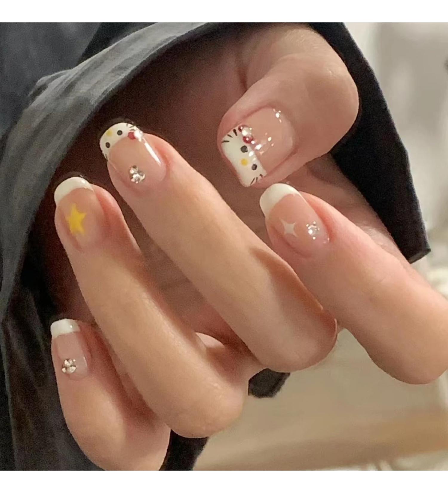 24Pcs Short French Tip Press on Nails - Cute Stars & Rhinestones Designs | Acrylic Fake Nails for Women & Girls | HG-15 Nail Art Decorations - Buy Online on GoSupps.com