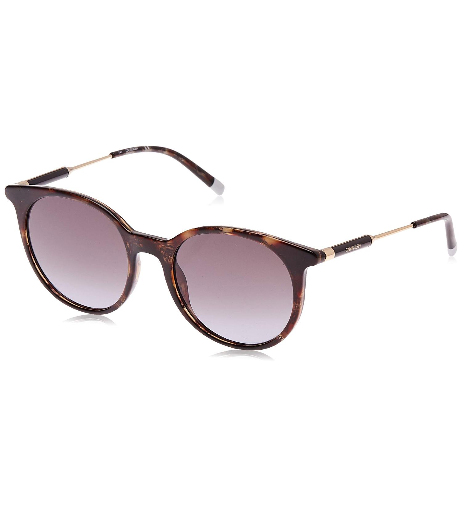 Calvin Klein Women's CK3208S Sunglasses - GREYFADE | Stylish One Size Eyewear for International Shipping - Buy Online on GoSupps.com
