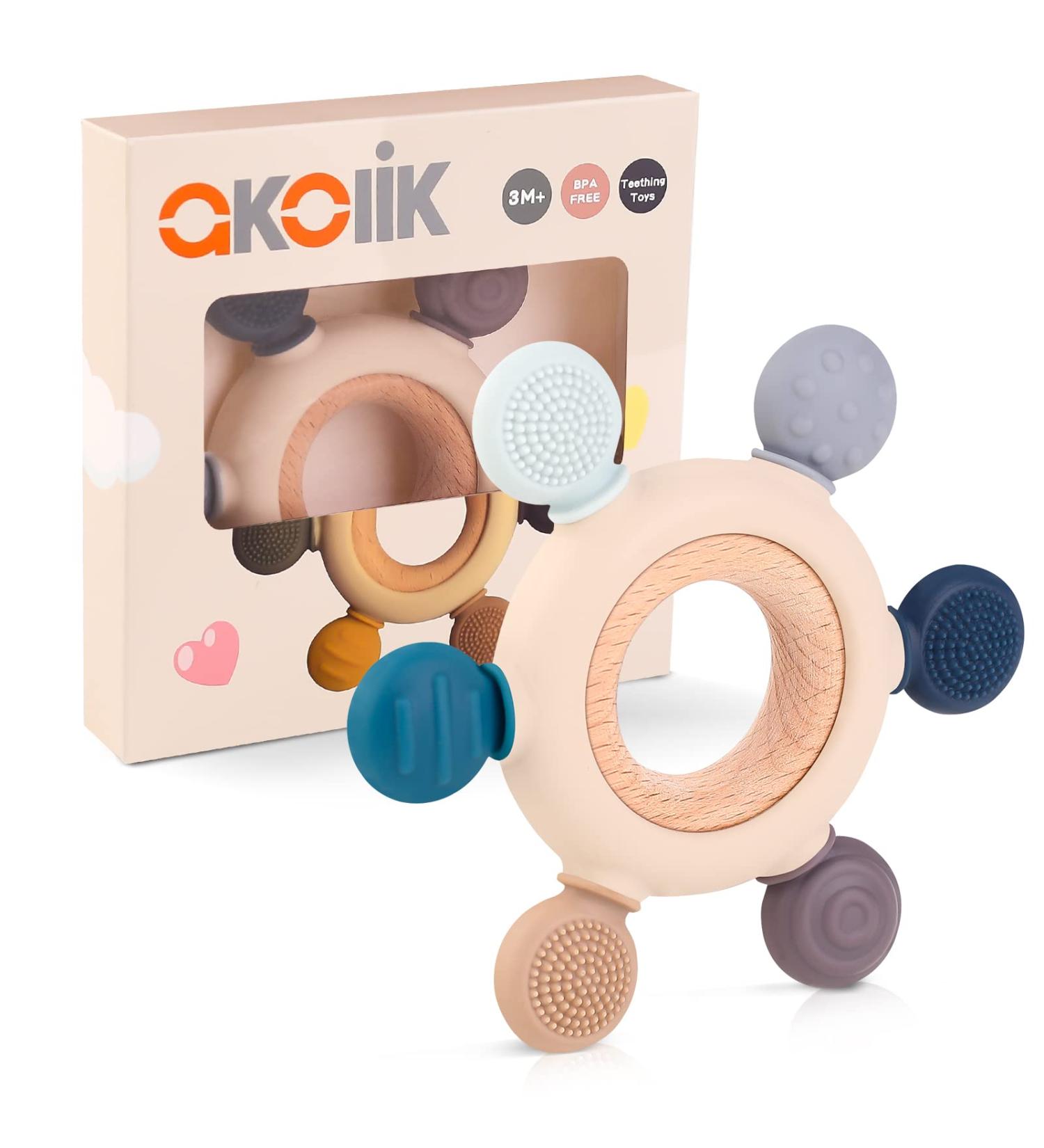 Akolik Teething Toy for Babies 0-6 6-12 Months | BPA-Free Silicone Teether with Wooden Ring | Chewable Rudder Design - Buy Online on GoSupps.com