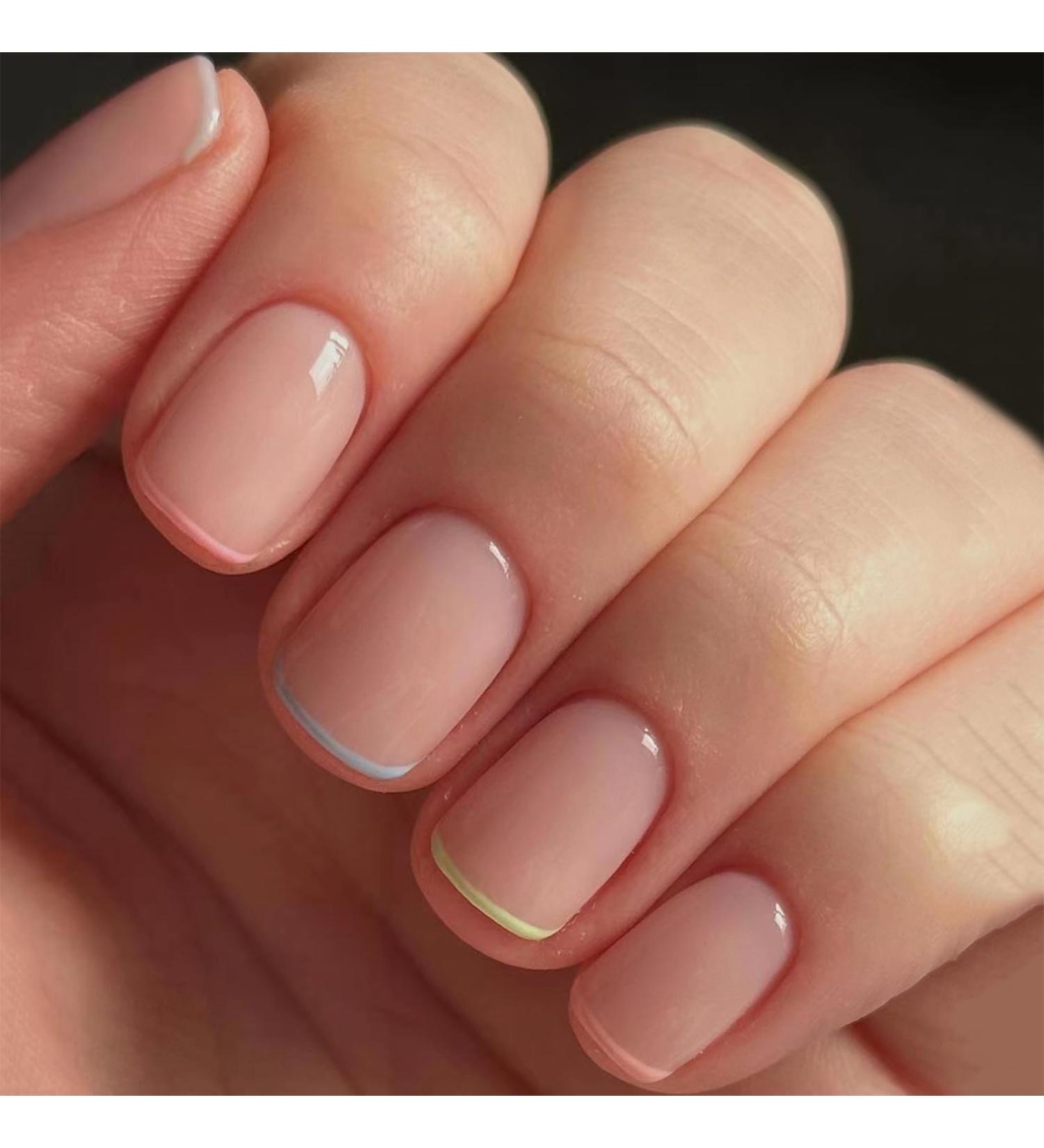 24 Pcs Short French Pattern False Nails with Nail Glue - Nude Colorful Line Design - Acrylic Stick on Nails for Women and Girls - Buy Online on GoSupps.com