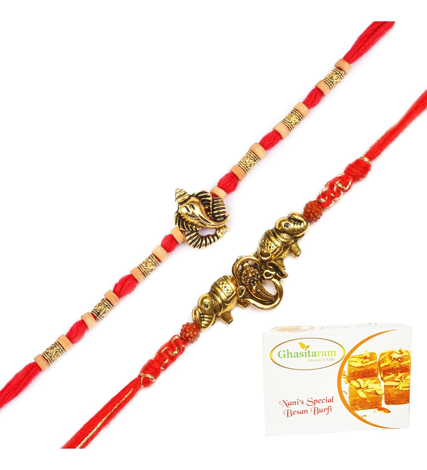 Ghasitaram Gifts Rakhi for Brother Rakhis Online - Set of 2 LD-9923 and LD-84 Om Ganesh Divine Rakhis with 400 GMS of Besan Barfi - Buy Online on GoSupps.com