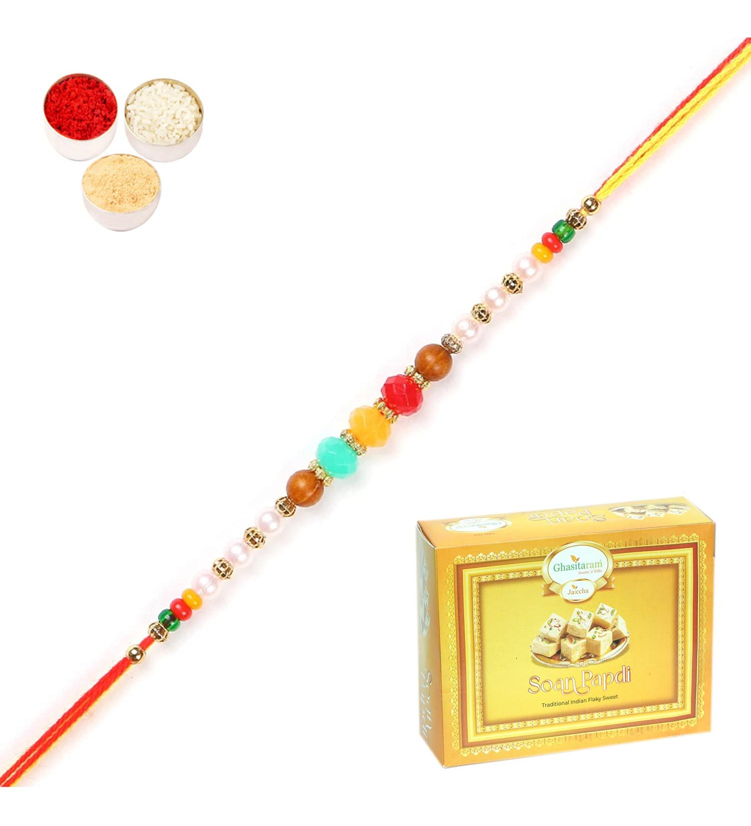 Ghasitaram Gifts Rakhis Online for Brother- 6045 Rakhi Thread with 200 GMS of Soan Papdi Rakhi with 200 gms of Soan Papdi - Buy Online on GoSupps.com