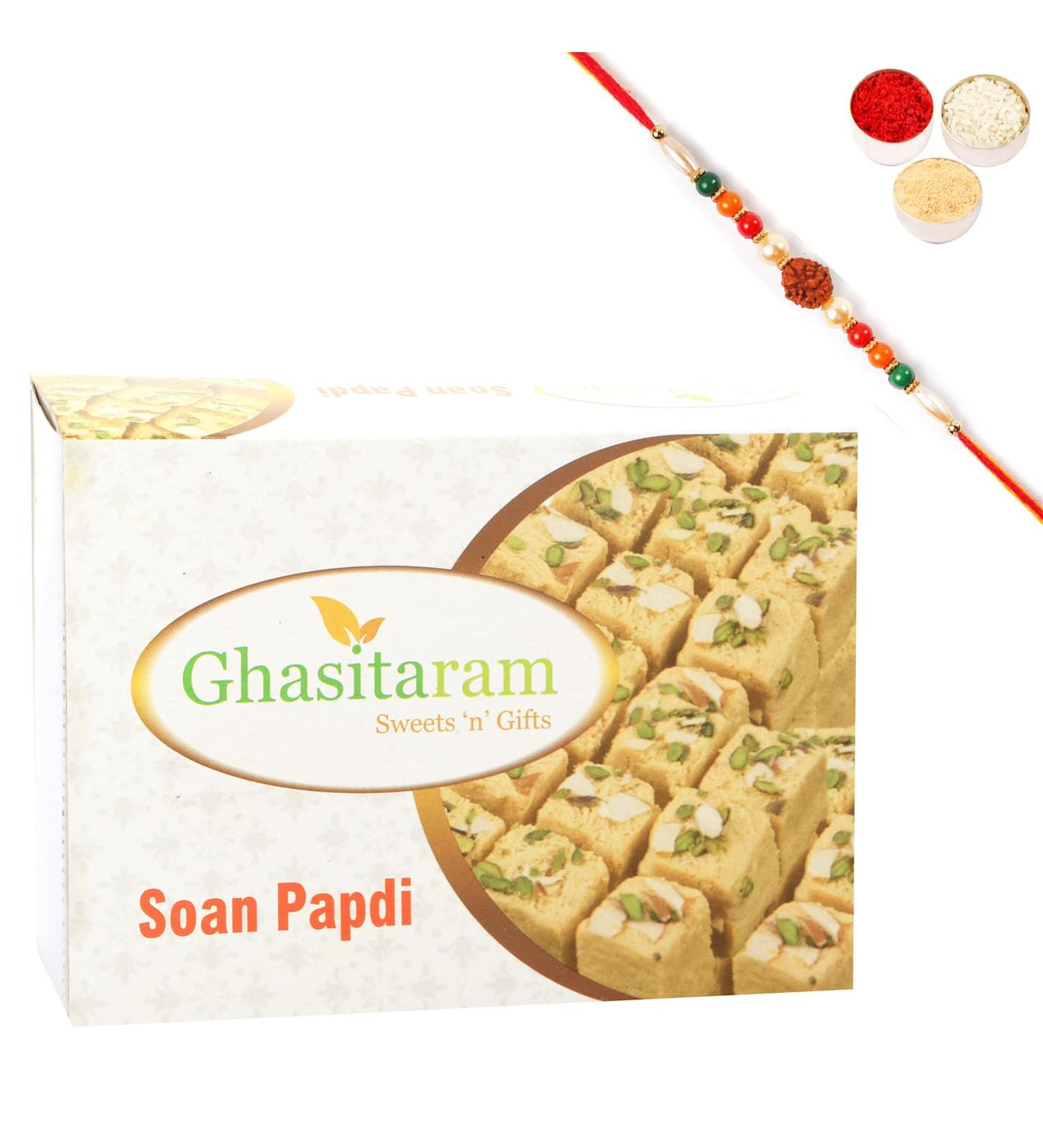Ghasitaram Gifts Rakhi Gifts for Brothers Rakhi Sweets - Ghasitaram's Soan Papdi (200 GMS) with Rudraksh Rakhi - Buy Online on GoSupps.com