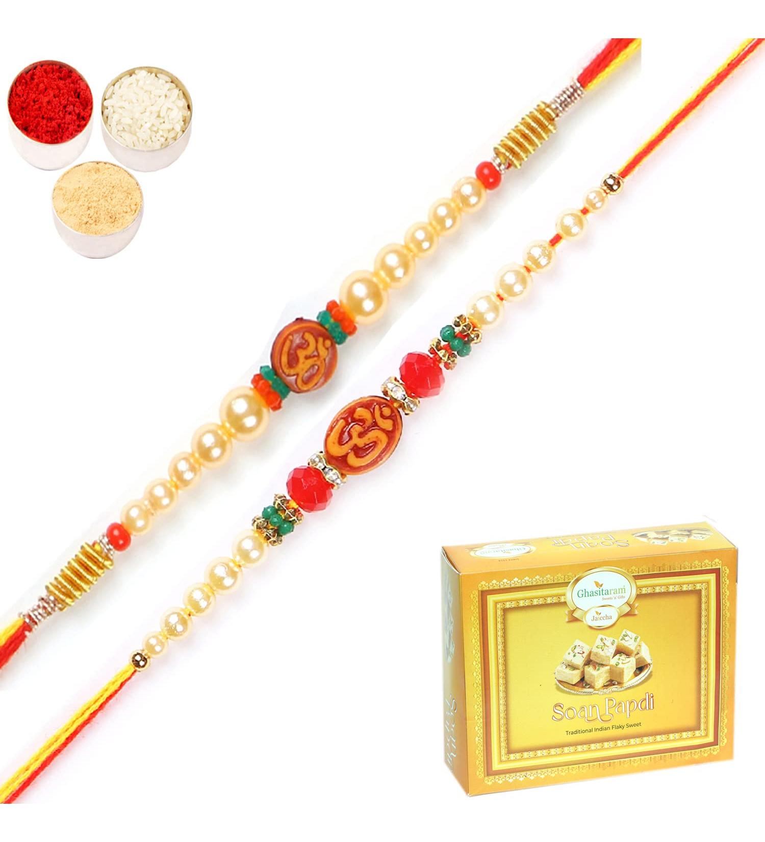Ghasitaram Gifts Rakhi for Brother Rakhis Online - Set of 2 6135 6276 Om Pearl Rakhi Threads with 400 GMS of Soan Papdi - Buy Online on GoSupps.com