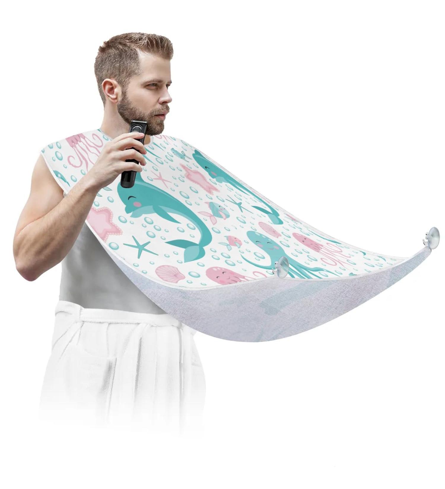 Beard Bib Apron for Men - Non-Stick Waterproof Hair Catcher Cape for Shaving & Trimming | Dolphin Jellyfish & Starfish Designs - International Shipping Available - Buy Online on GoSupps.com