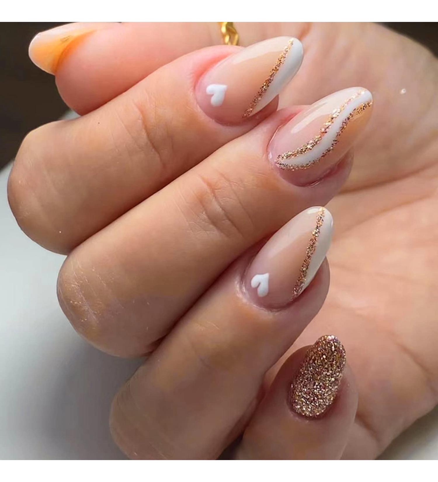 24Pcs Short Almond French Tip False Nails - Gold Glitter Swirl Design | Glossy Fake Nails with White Heart | Acrylic Stick on Nails for Women - Buy Online on GoSupps.com