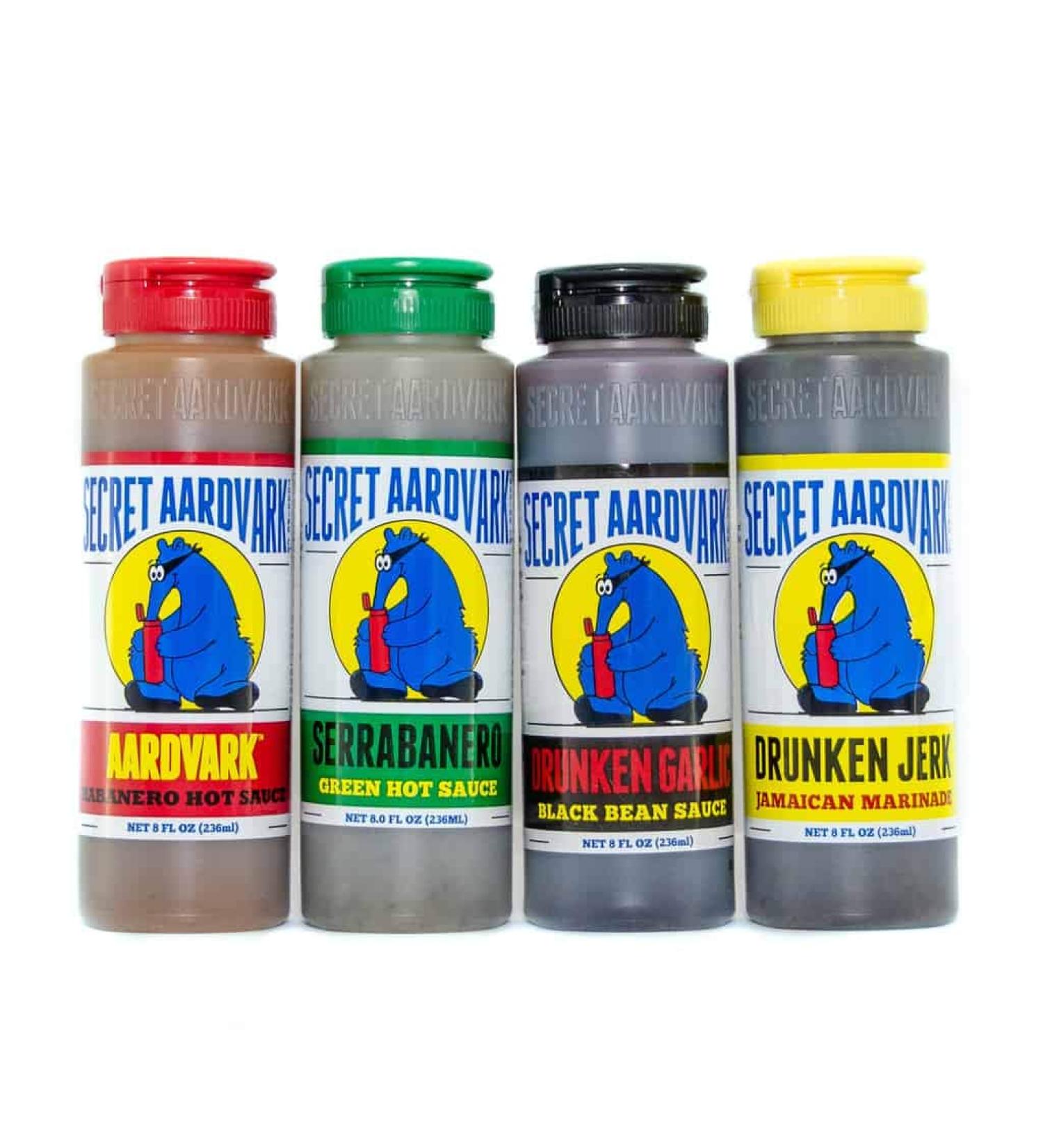 Secret Aardvark Hot Sauce Sampler Pack | Variety of Habanero, Drunken Jerk, Garlic Black Bean, Serrabanero | Non-GMO & Low Carb | 8 oz Bottles (4 Pack) - Buy Online on GoSupps.com