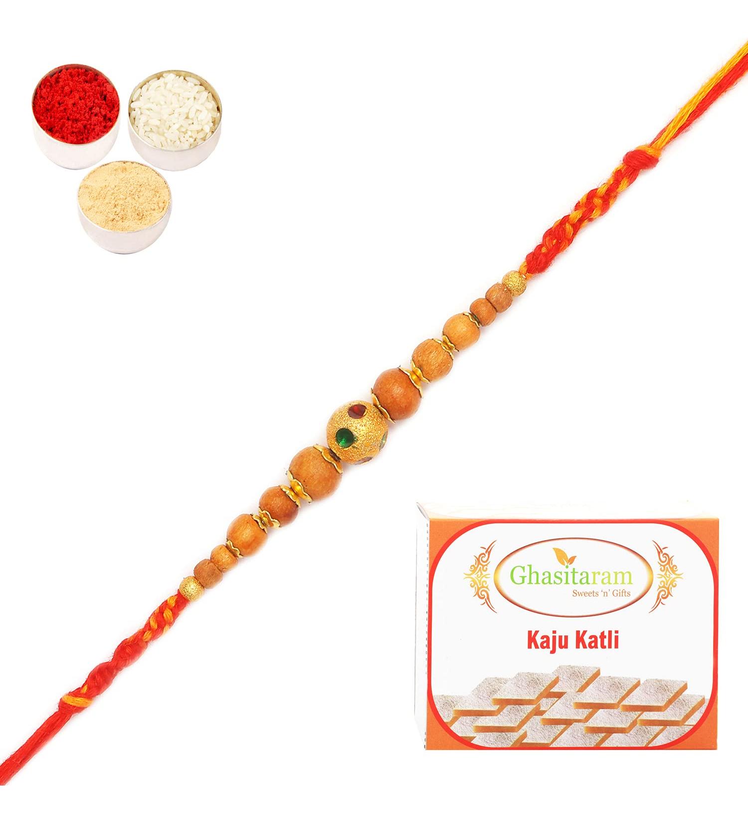 Ghasitaram Gifts Rakhi for Brother Rakhis Online - Rs-128 Fancy Thread Rakhi with 400 GMS of Kaju katli - Buy Online on GoSupps.com