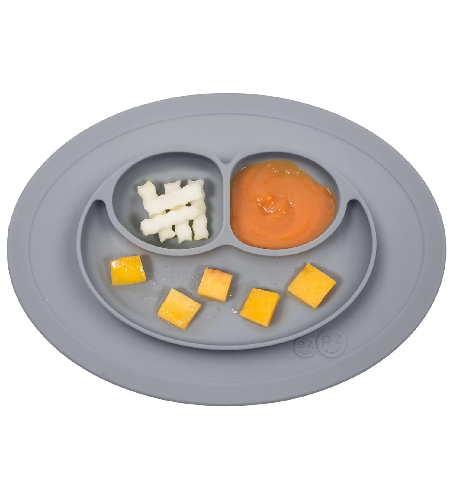 ezpz Mini Mat (Gray) - Silicone Suction Plate for Infants & Toddlers | Built-in Placemat, Self-Feeding | Reusable Travel Bag - Buy Online on GoSupps.com