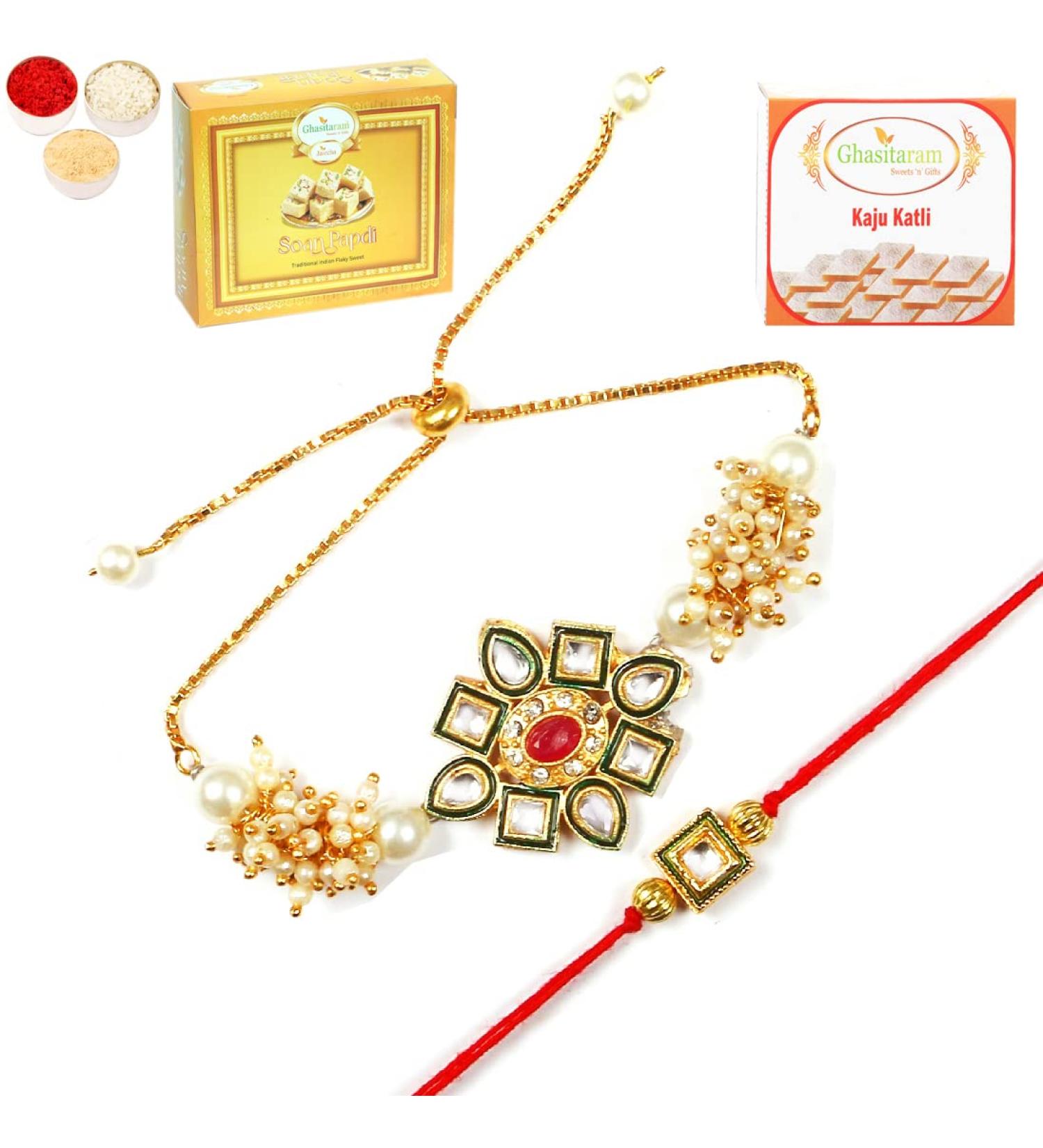 Ghasitaram Gifts Rakhis Online - Rakhi for Brother-RT-Stone Bhaiya Bhabhi Rakhi with 200 GMS of Kaju katli and 200 GMS of Soan Papdi Rakhi Set with 200 gms of Kaju katli & Soan Papdi - Buy Online on GoSupps.com