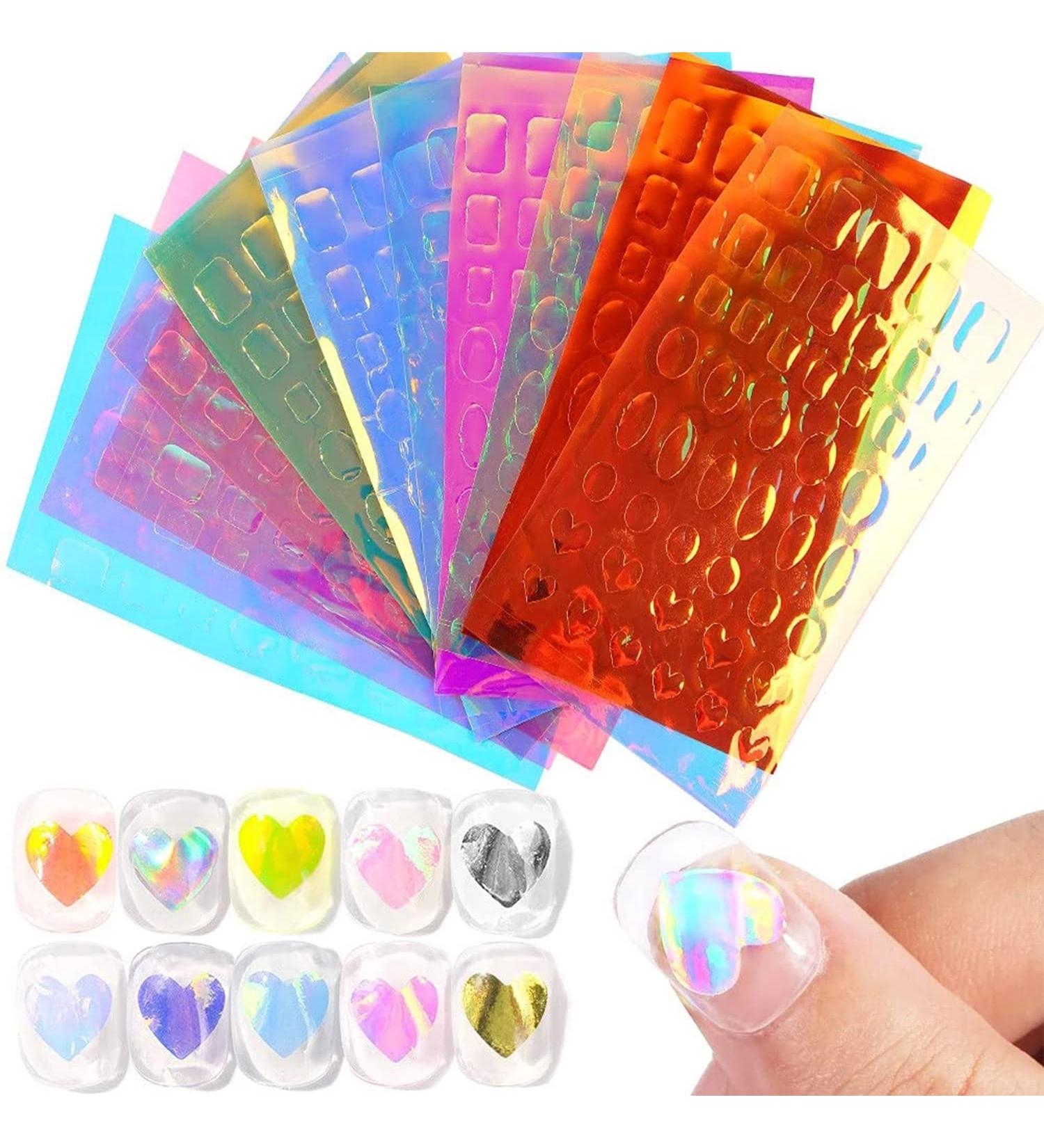 WOKOTO Aurora Nail Foil Sheets - 11 Self Adhesive Holographic Mix Shapes for DIY Nail Art Decoration - Laser Nail Decals for Women and Girls - Buy Online on GoSupps.com