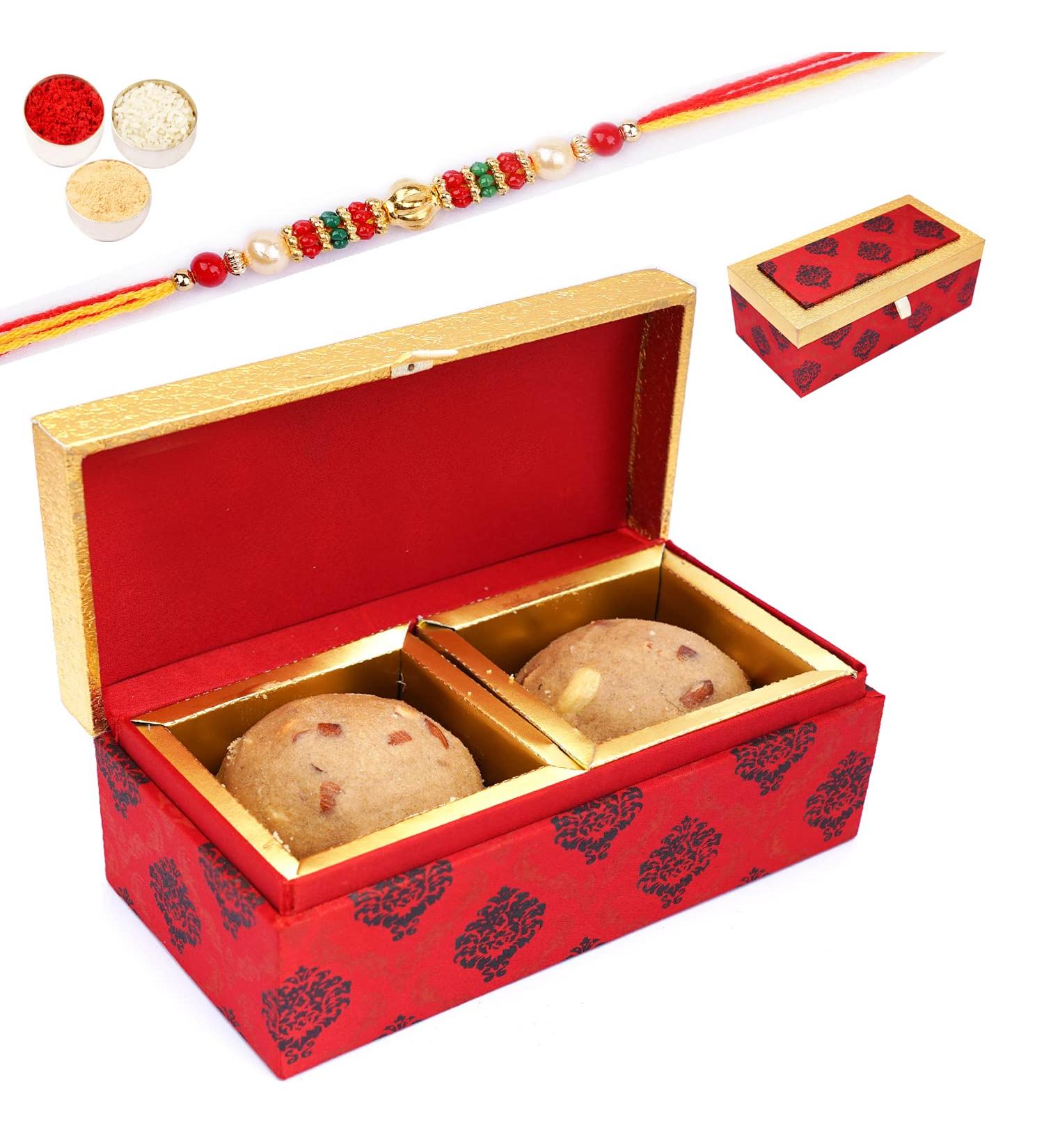 Ghasitaram Gifts Rakhi Gifts for Brothers 2 Laddoo Box of Panjeeri laddoo with Pearl Beads Rakhi - Buy Online on GoSupps.com
