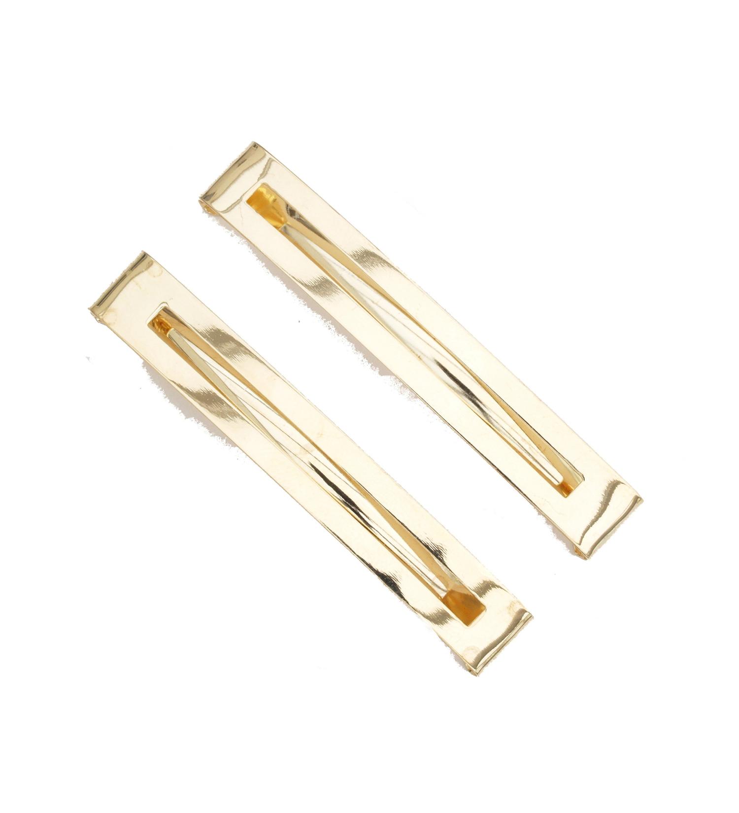 Pair of gold effect clip-in end barrettes hair slides with cut-out design. Useful hair accessory.