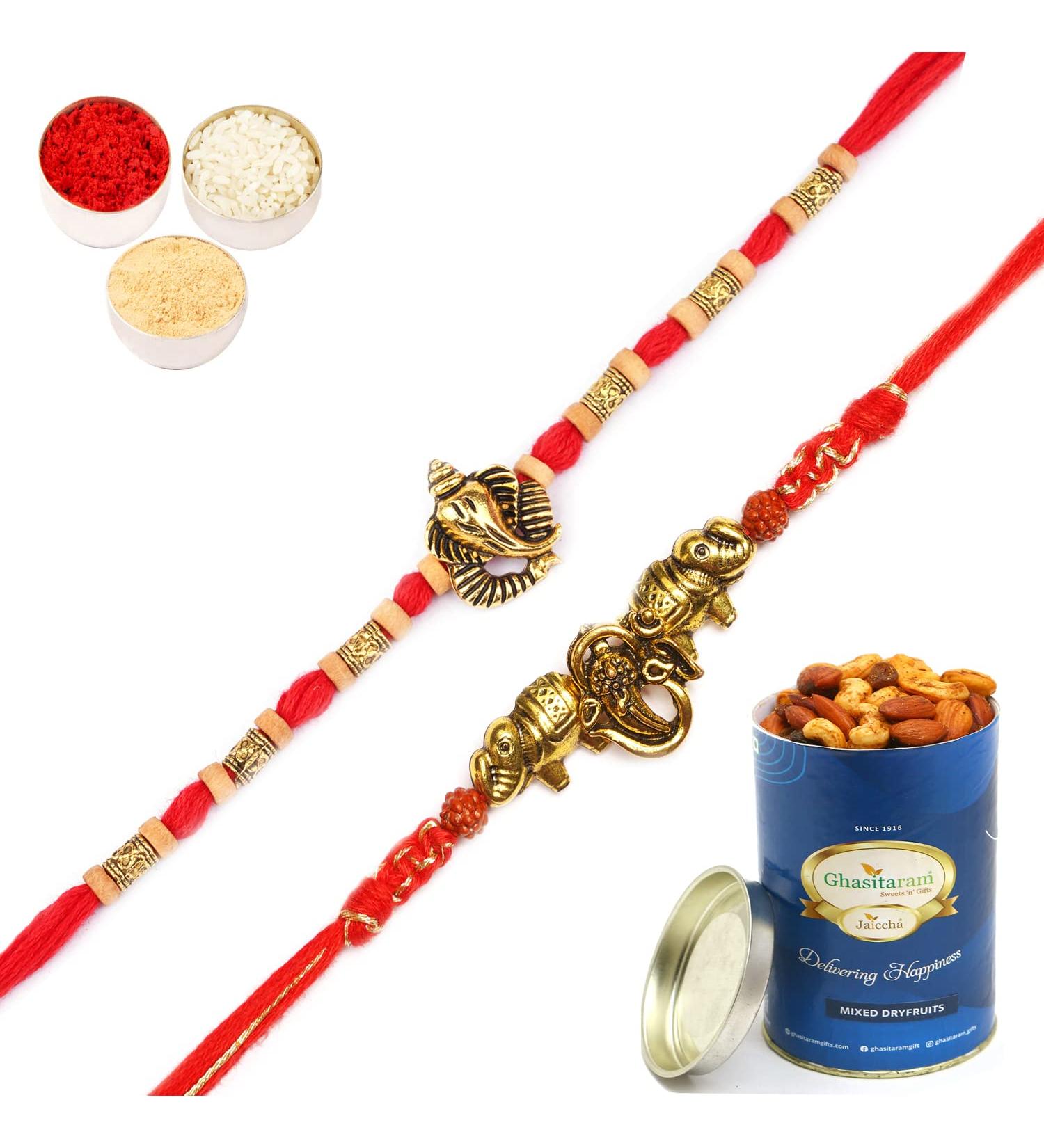 Ghasitaram Gifts Rakhi for Brother Rakhis Online - Set of 2 LD-9923 and LD-84 Om Ganesh Divine Rakhis with 100 GMS of Dryfruits Mix Can - Buy Online on GoSupps.com