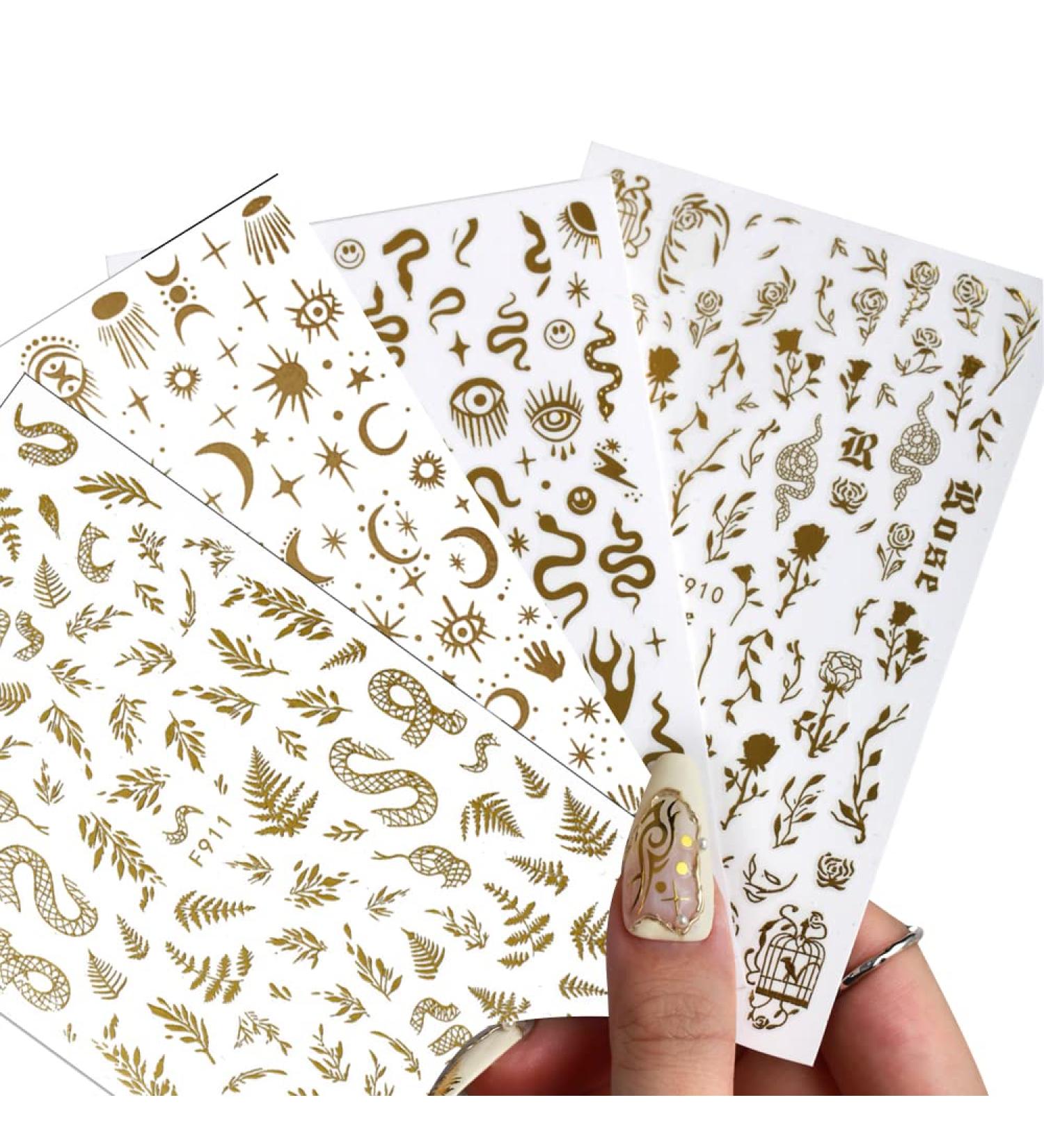 Gold Nail Stickers - 4 Sheets 3D Self-Adhesive Nail Art Decorations for Women - Snake Eyes, Heart, Rose Design - Acrylic Nail Decor - Buy Online on GoSupps.com