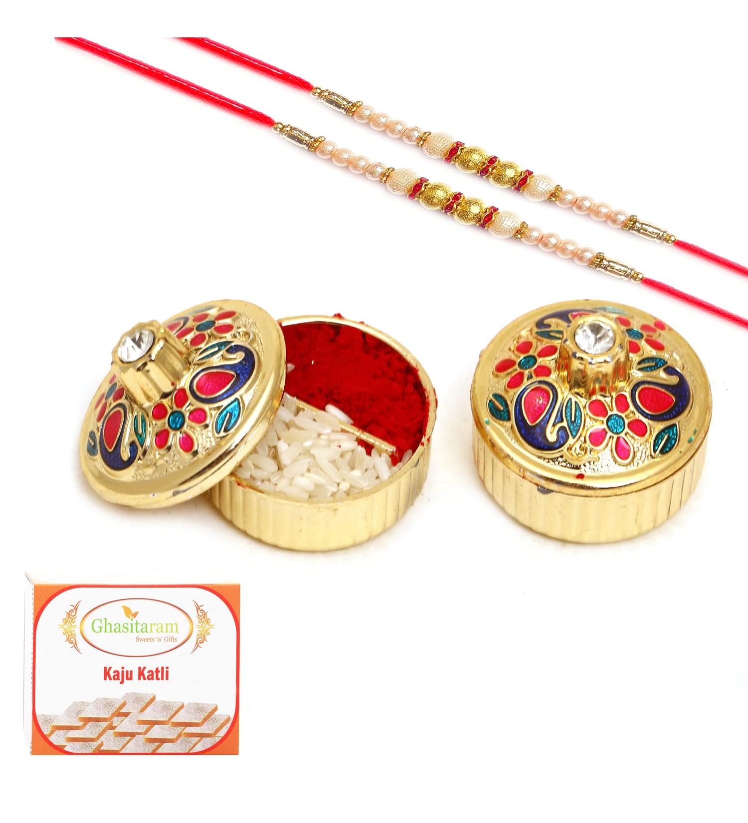 Ghasitaram Gifts Rakhi Gifts Pooja Thali - Set of 2 YCA-10 Tika Chawal Containers with 2 Pearl rakhis with 200 GMS of Kaju katli Containers 2 rakhis with 200 GMS of Kaju katli - Buy Online on GoSupps.com
