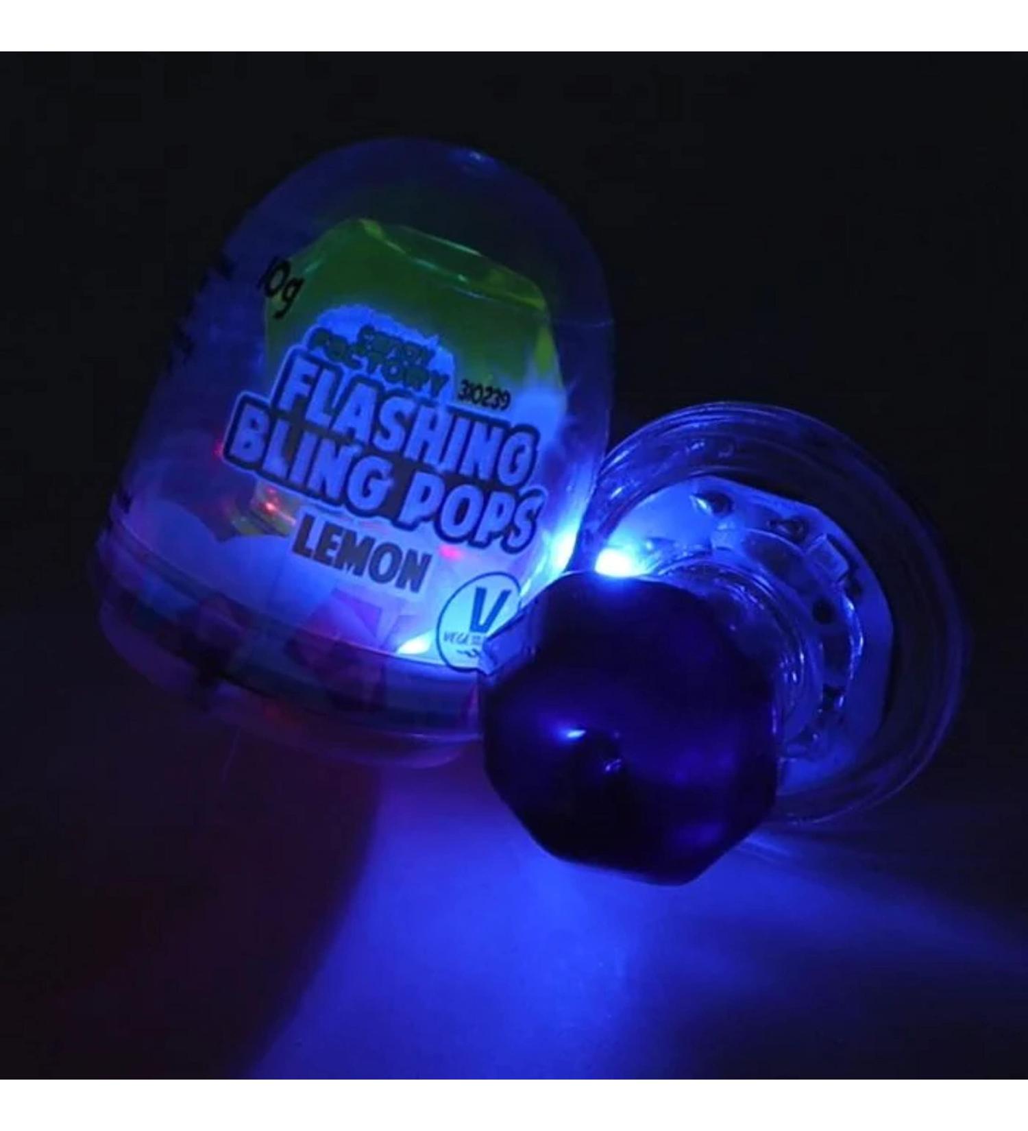 Flashing lolly Pops pack of 8 sweets .Grape lemon & strawberry flavour lollipops .watch it shine! Perfect novelty treat.