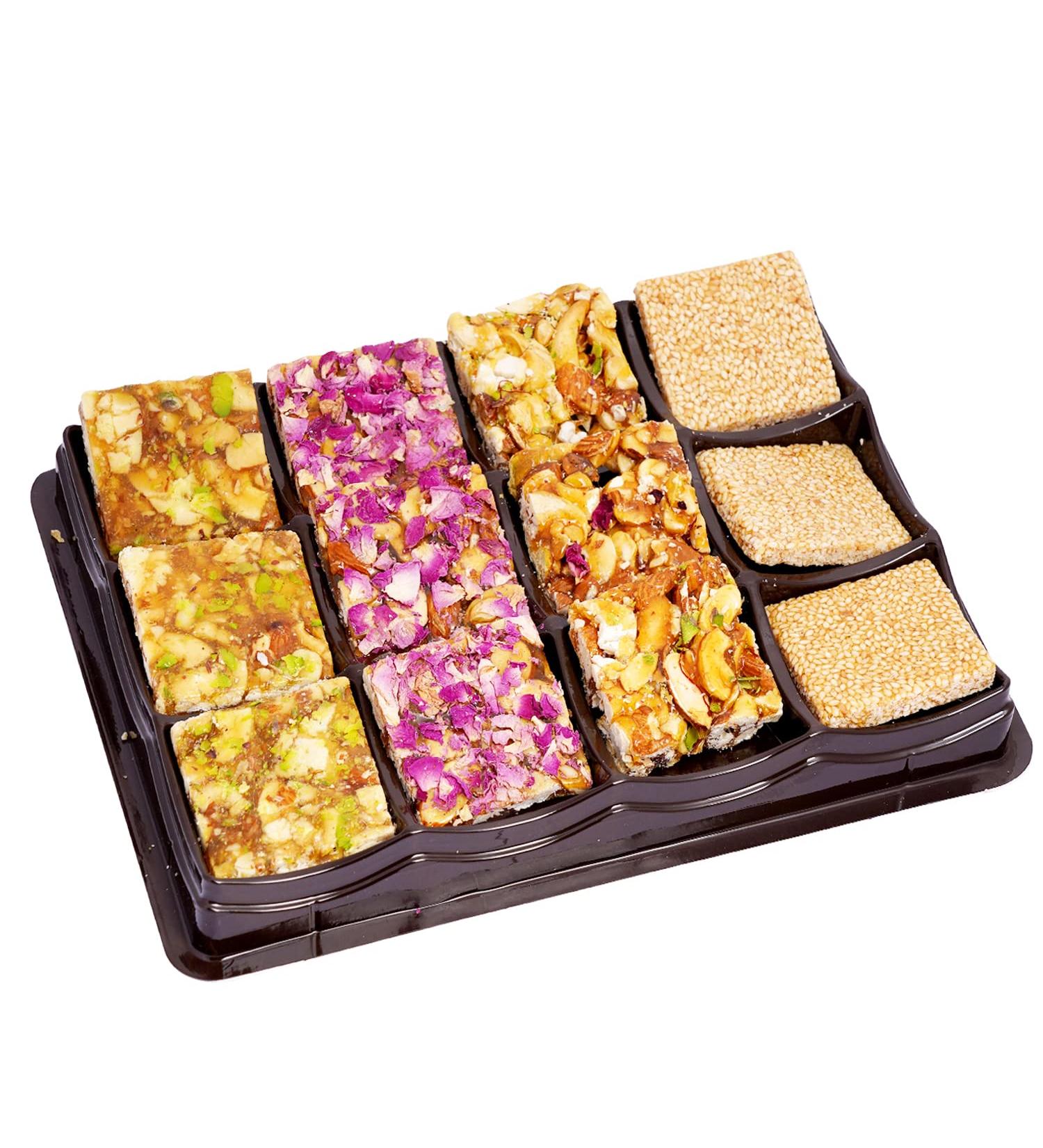 Ghasitaram Gifts Valentines Gift for Girlfriend/Boyfriend/Husband and Wife Assorted Chikki Lid Box - Buy Online on GoSupps.com