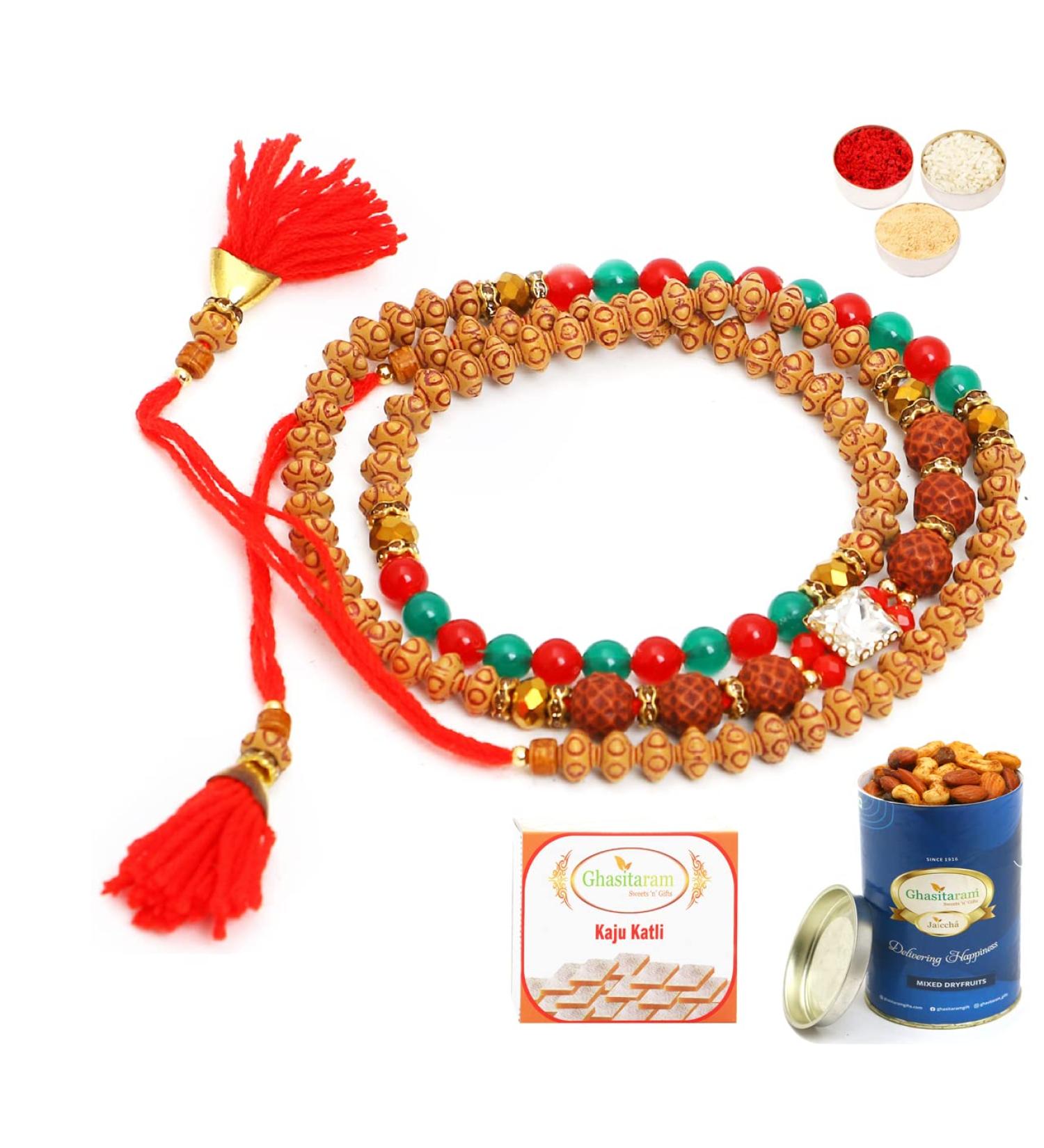 Ghasitaram Gifts Rakhi for Brother Rakhis Online - 614 Premium Rakhi Bracelet with 100 GMS of Dryfruits Mix Can 200 GMS of Kaju katli Rakhi & 100g Dryfruits Mix Can 200g Kaju katli - Buy Online on GoSupps.com