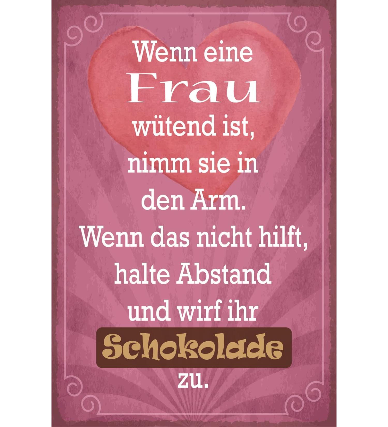 Tin sign 30 x 20 cm saying: If a woman is angry take her in her arm.If that doesn't help keep your distance and throw your chocolate too - Dekono7