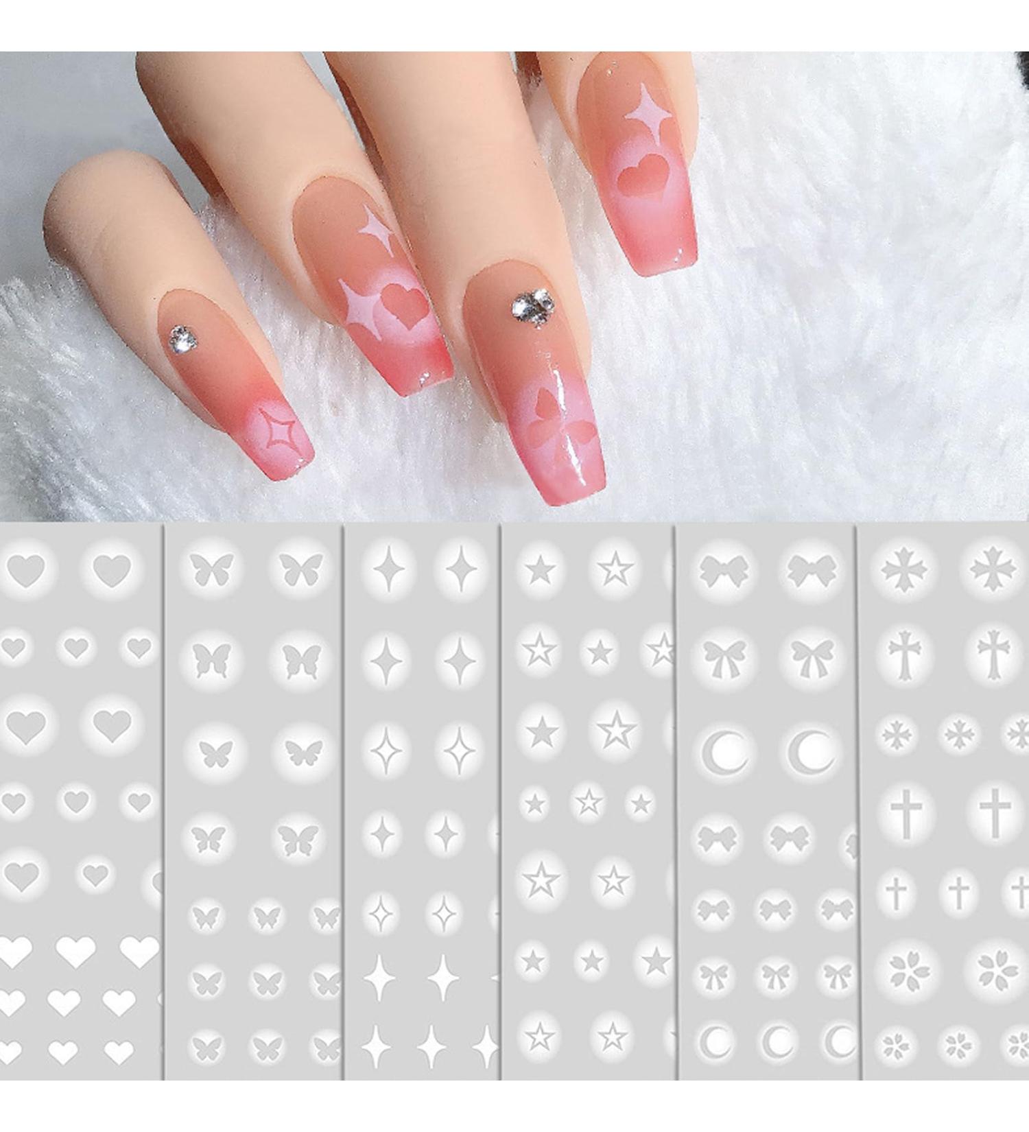 NICENEEDED White Airbrush Nail Art Stencils Stickers Holographic Hollow 3D Self-Adhesive Design Butterfly Bow Stars Moon Heart Cross Nail Transfer Decals for Women Girls Manicure Charms Decoration - Buy Online on GoSupps.com