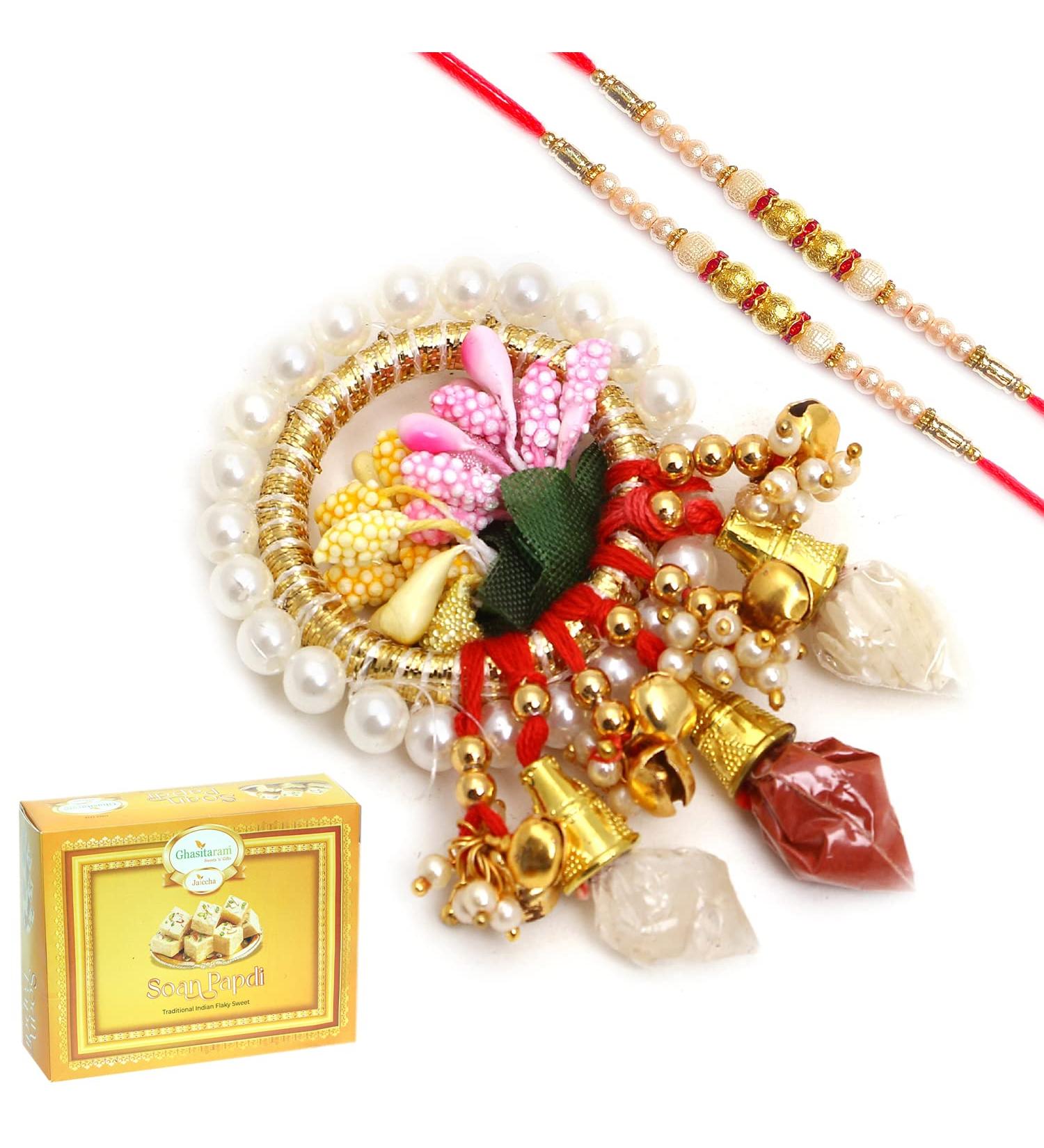 Ghasitaram Gifts Rakhi Gifts Pooja Thali - RM683 Tika Chawal Container with 2 Pearl rakhis with 400 GMS of Soan Papdi Container with 2 rakhis with 400 GMS of Soan Papdi - Buy Online on GoSupps.com